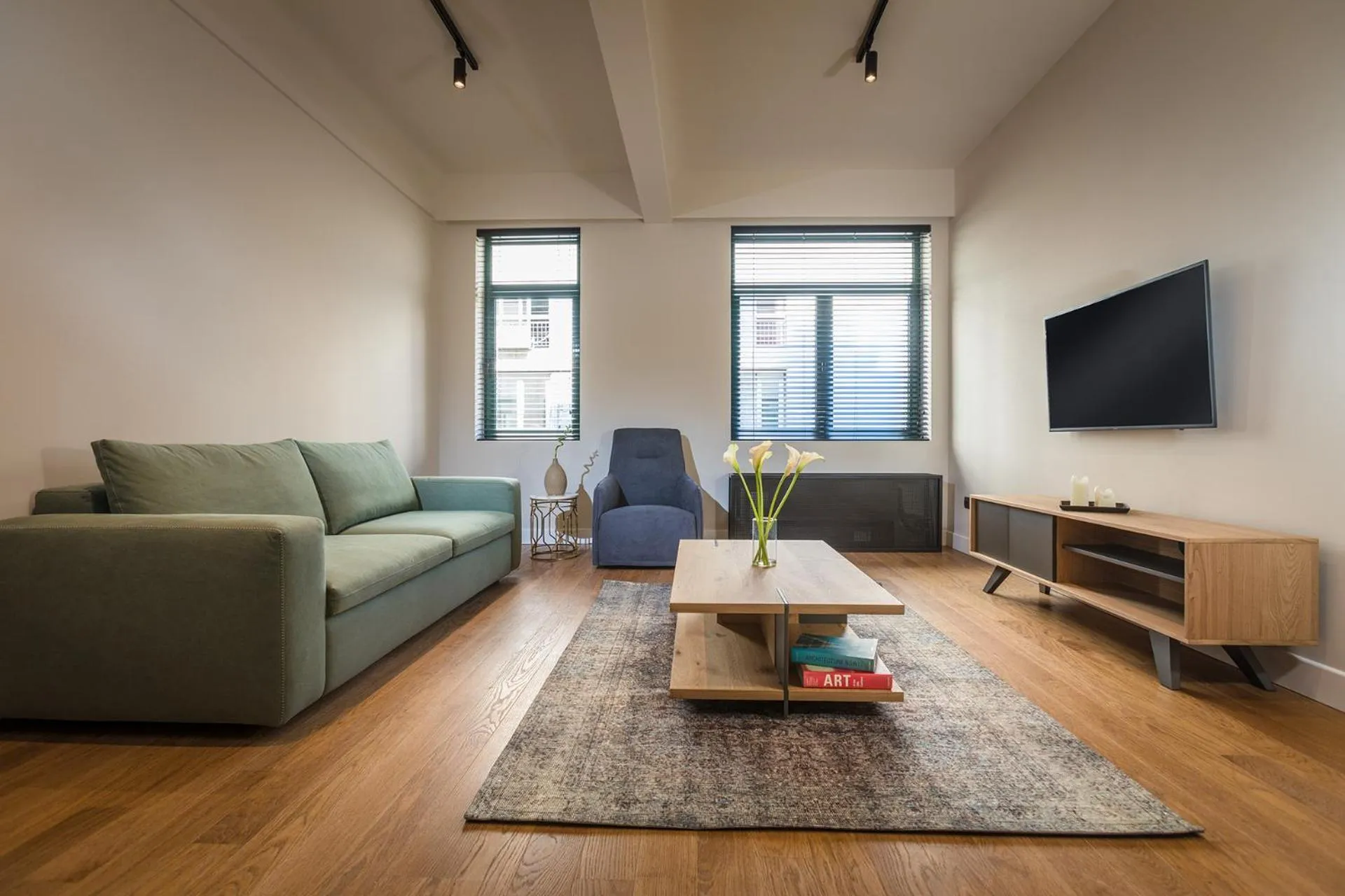 Communal lounge/ TV room in Klepsydra Urban Suites