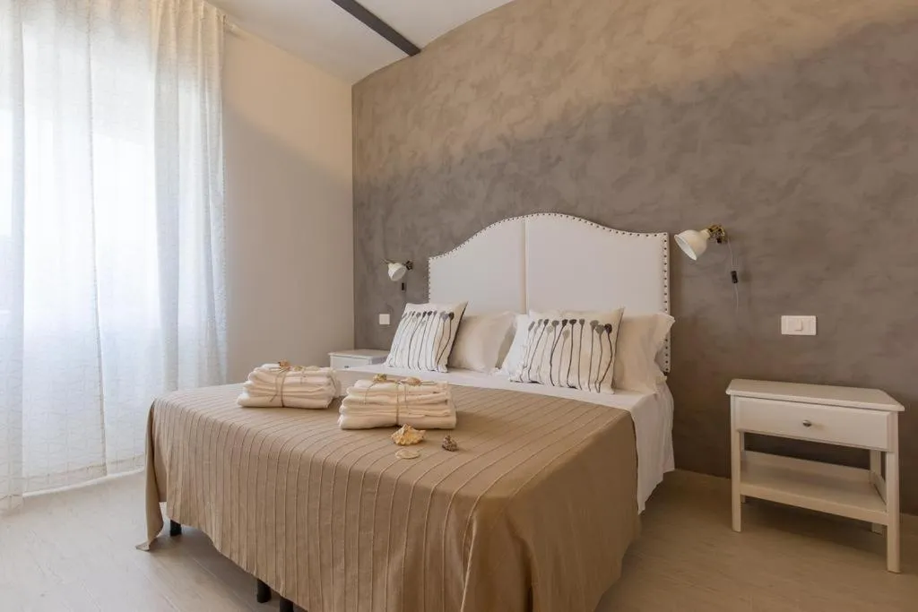 Bed in Al Faro Bianco B&B e Residence con parcheggio