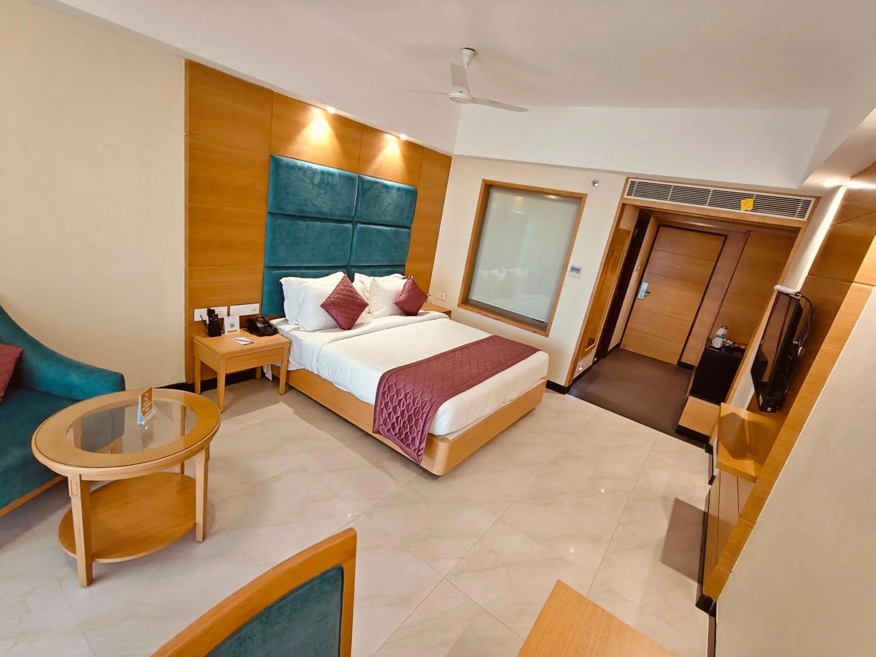 Bed in MM Legacy - A Bergamont Hotel, Kanchipuram