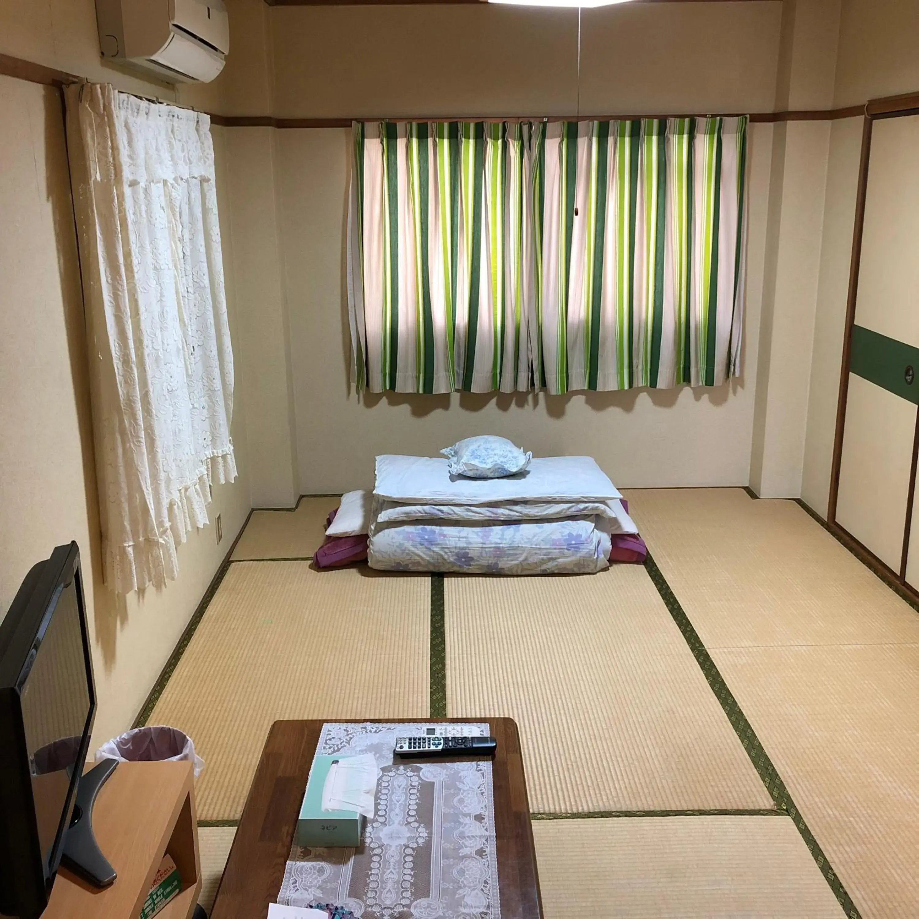 Photo of the whole room, Bed in Imazato Ryokan Photo of the whole room, Bed in Imazato Ryokan