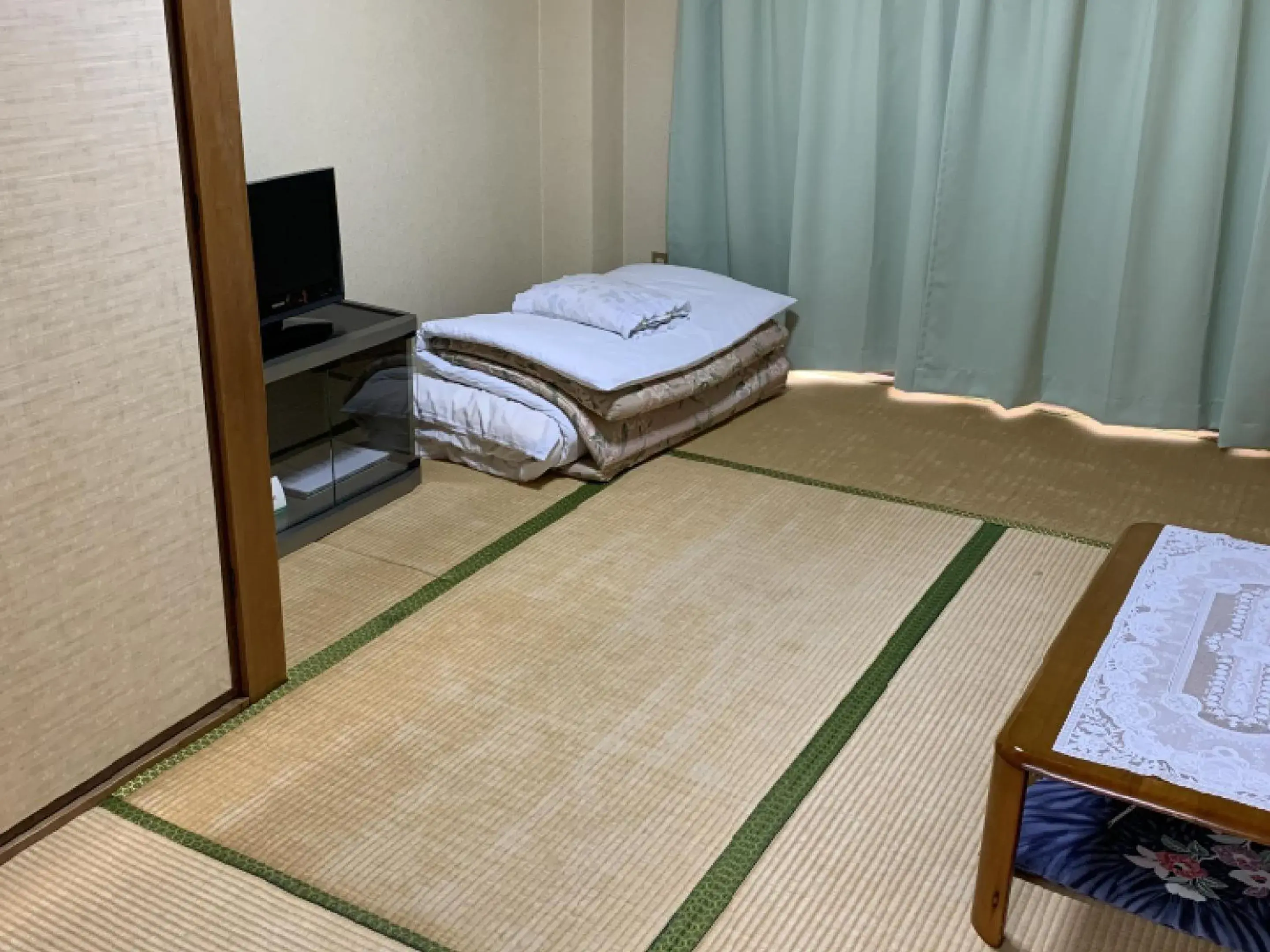 Photo of the whole room, Bed in Imazato Ryokan Photo of the whole room, Bed in Imazato Ryokan