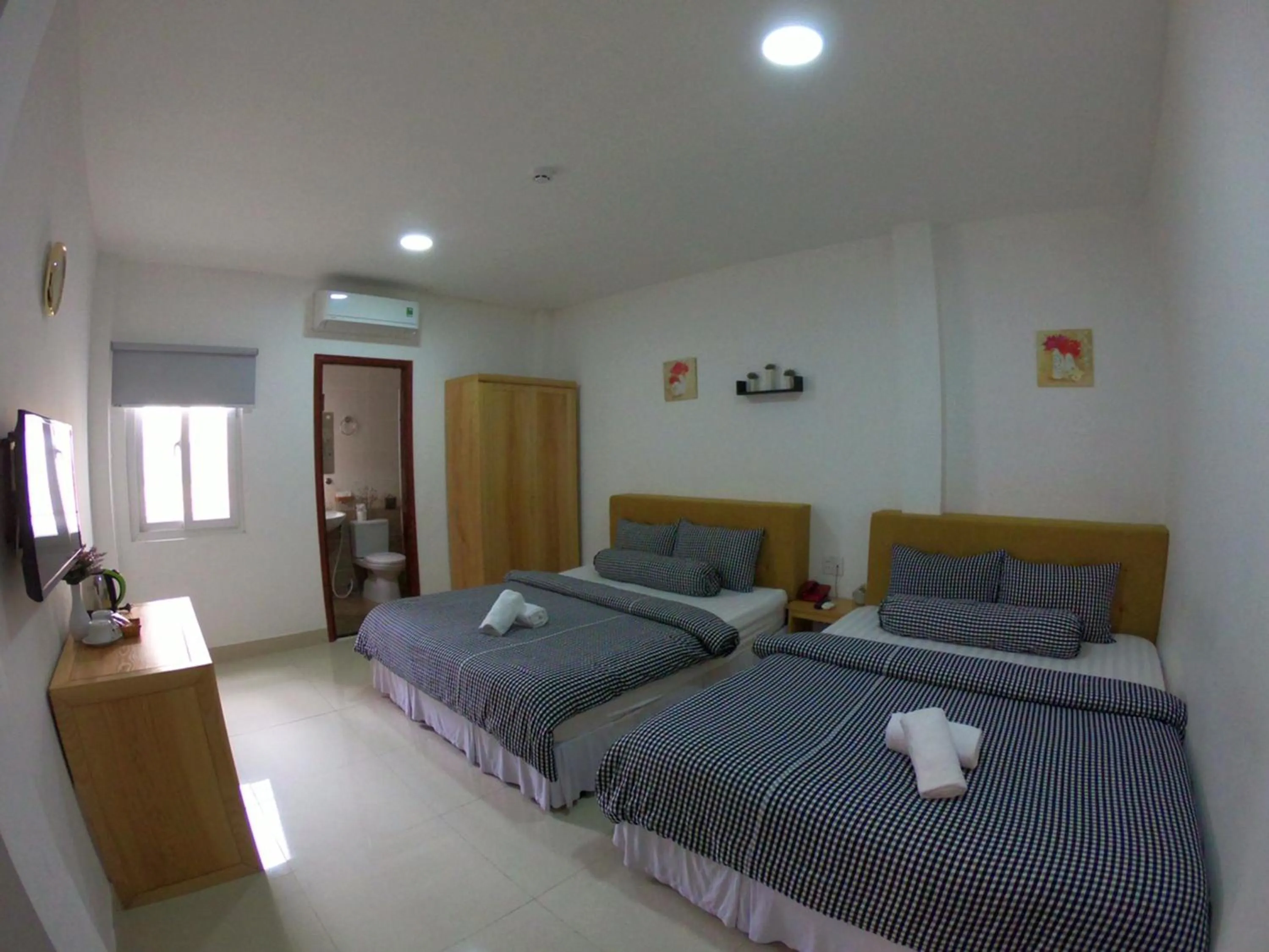 Deluxe Quadruple Room in Phan Anh Hotel - Bui Vien Walking Street