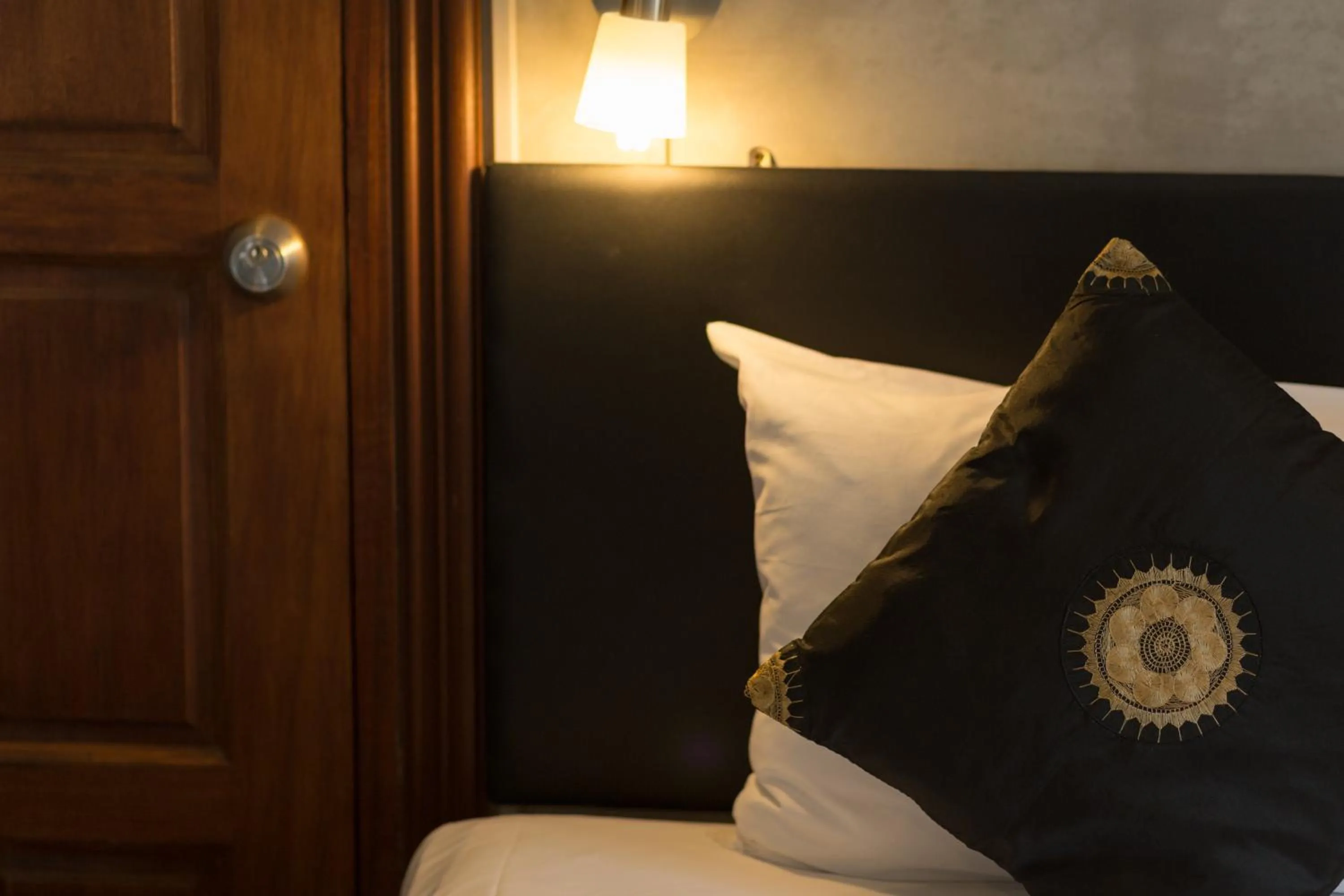 Bed in Baan Kamala Fantasea Hotel