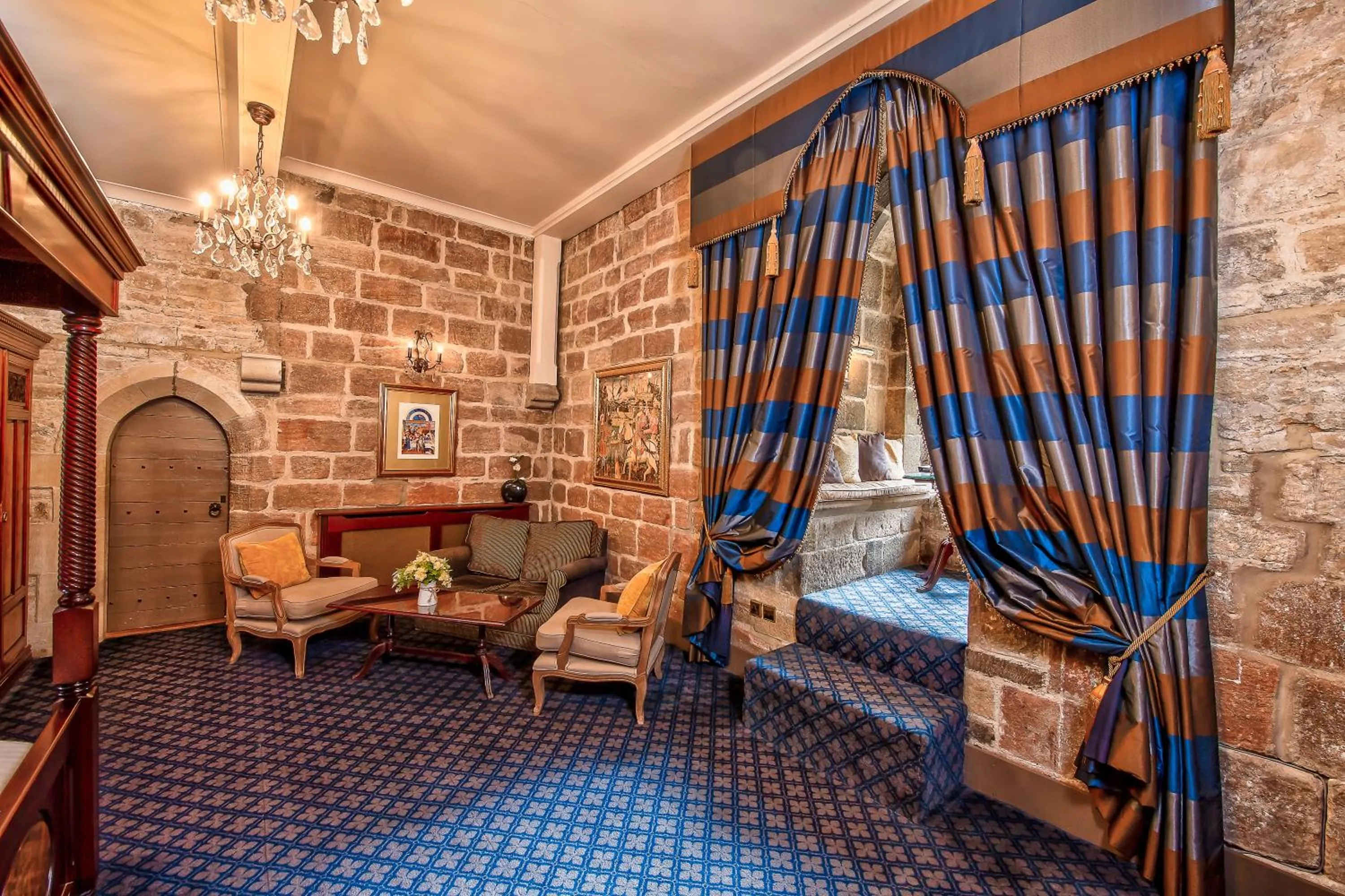 Seating area, Bed in Langley Castle Hotel