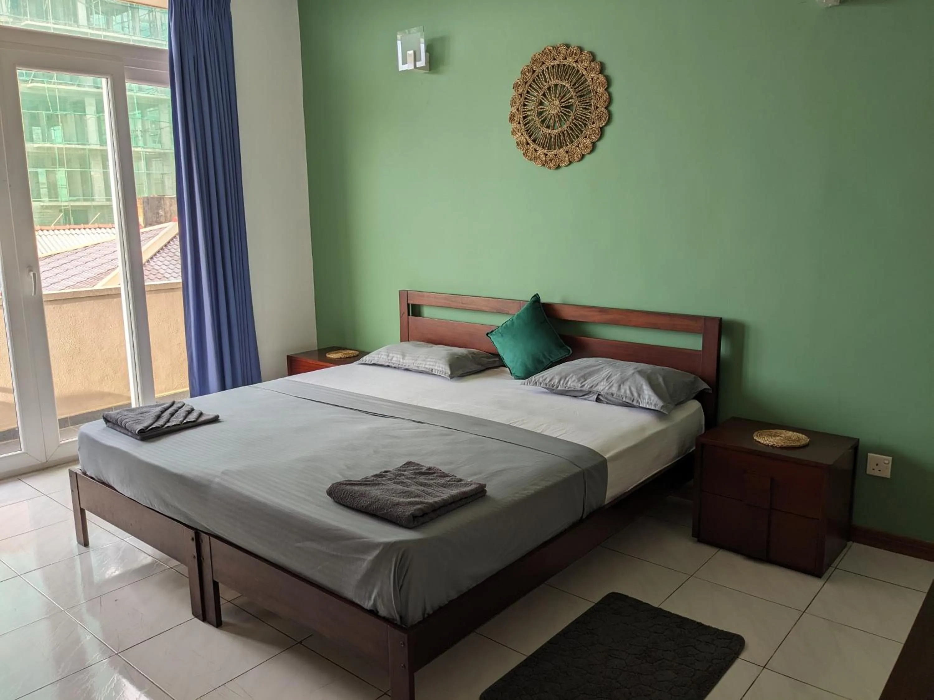 Bed in Palmyrah Residencies