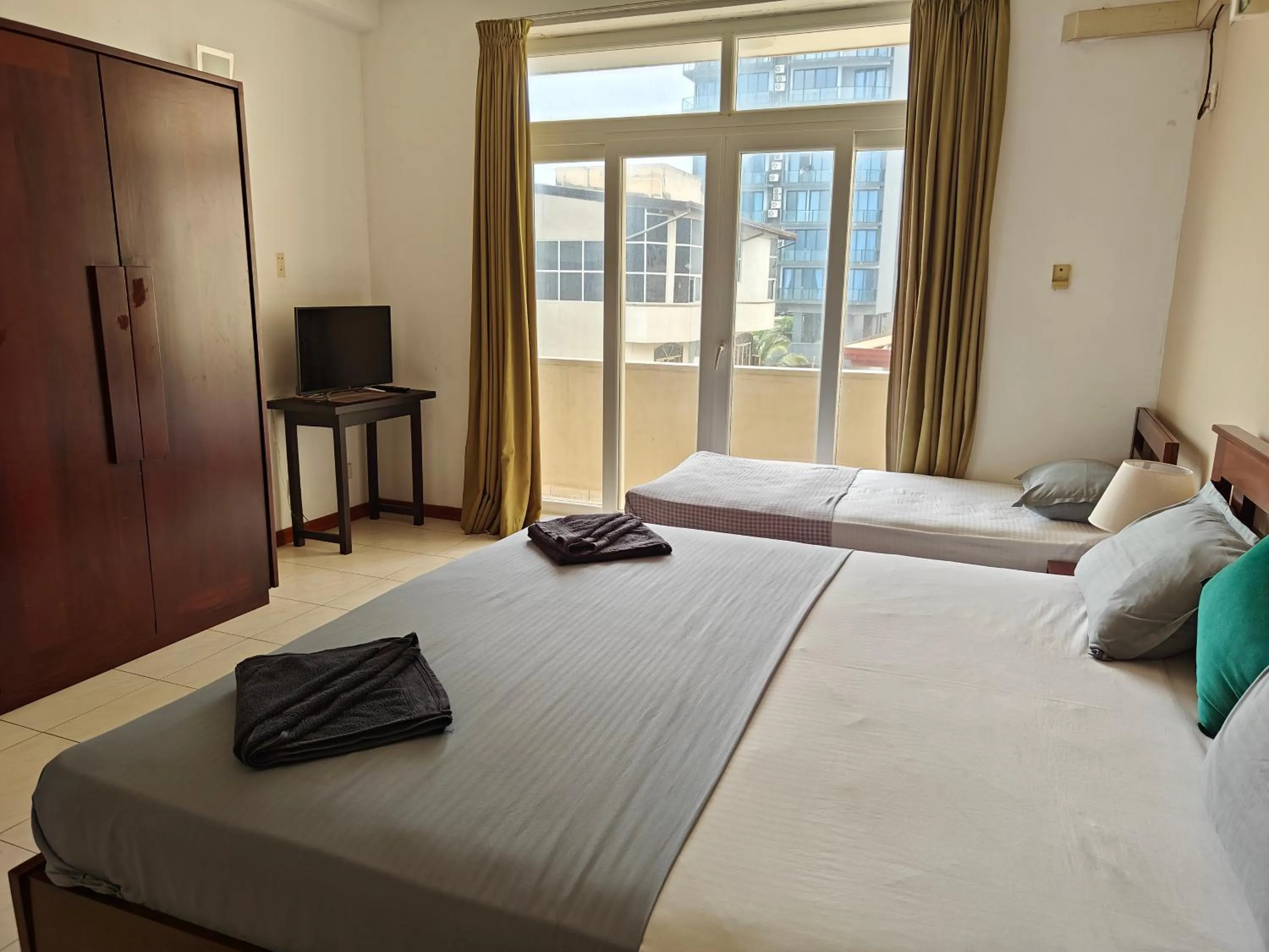 Bed in Palmyrah Residencies