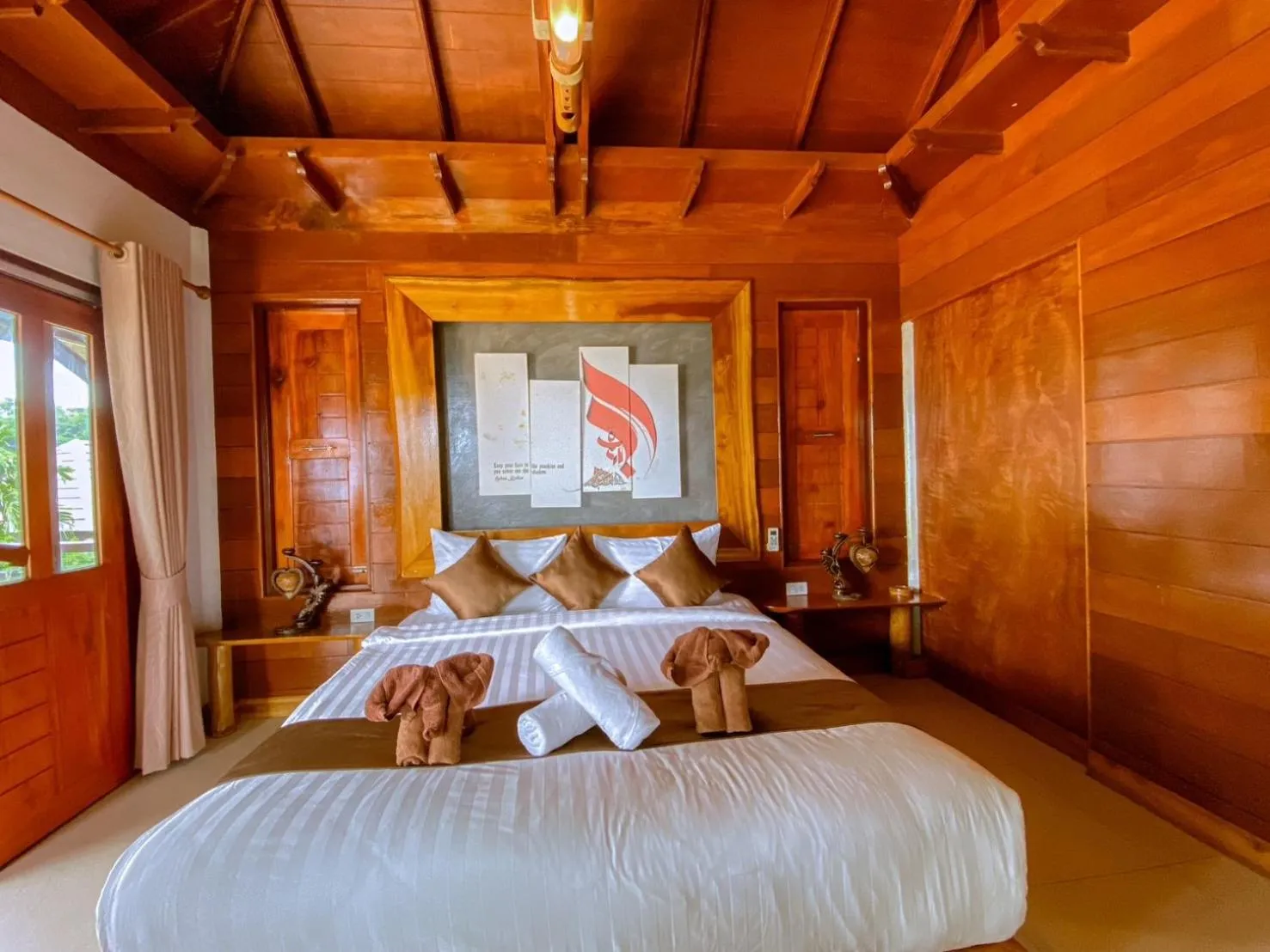 Bed in Puteri Lanta Family Villas