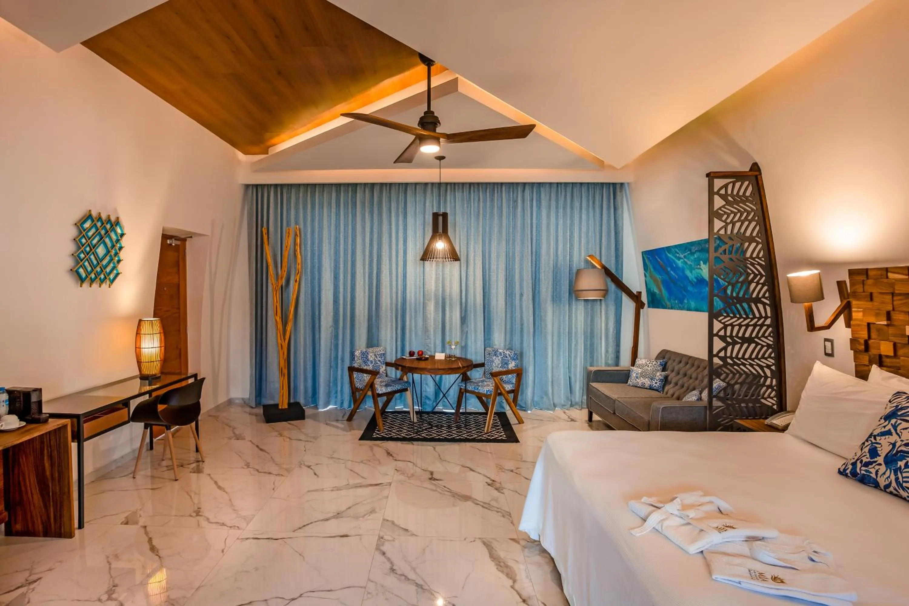 Bed in Mia Bacalar Luxury Resort & Spa