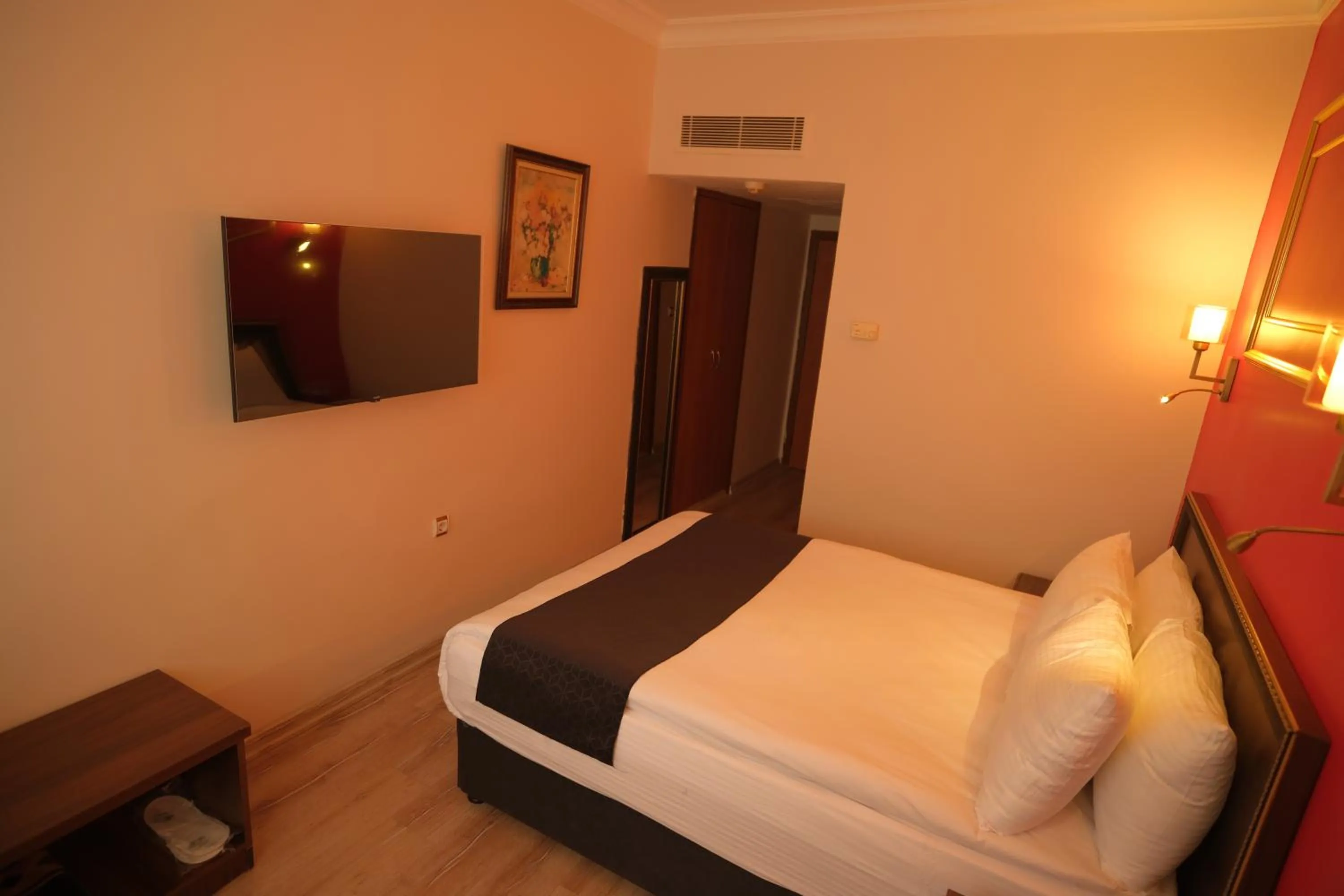 Bedroom in Malabadi Hotel