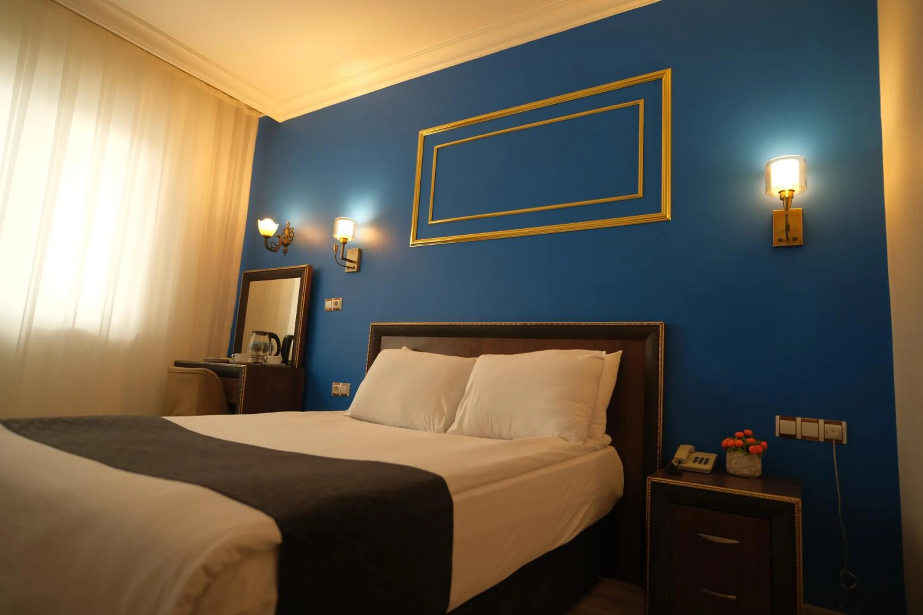 Bedroom in Malabadi Hotel