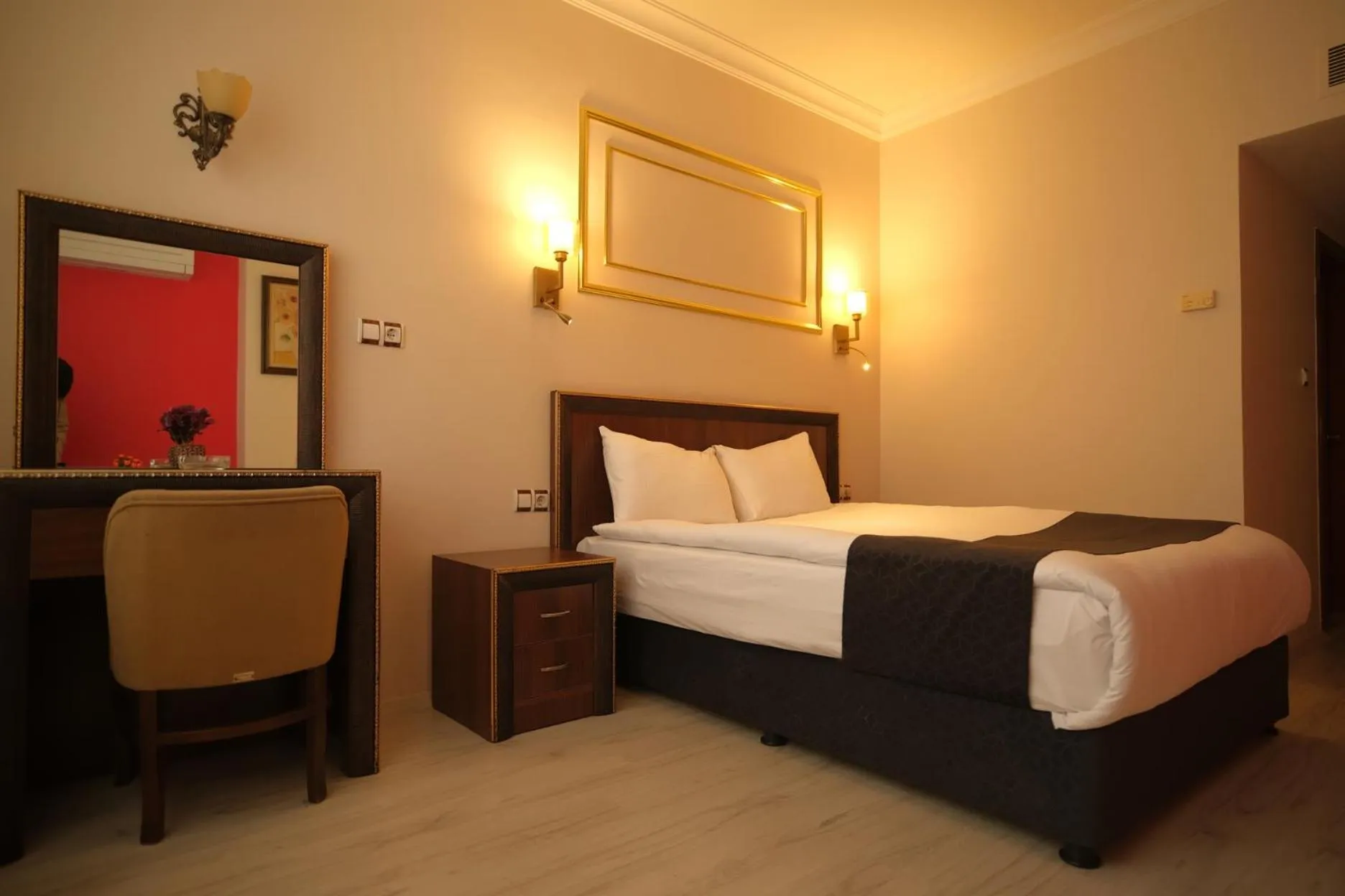 Bedroom in Malabadi Hotel