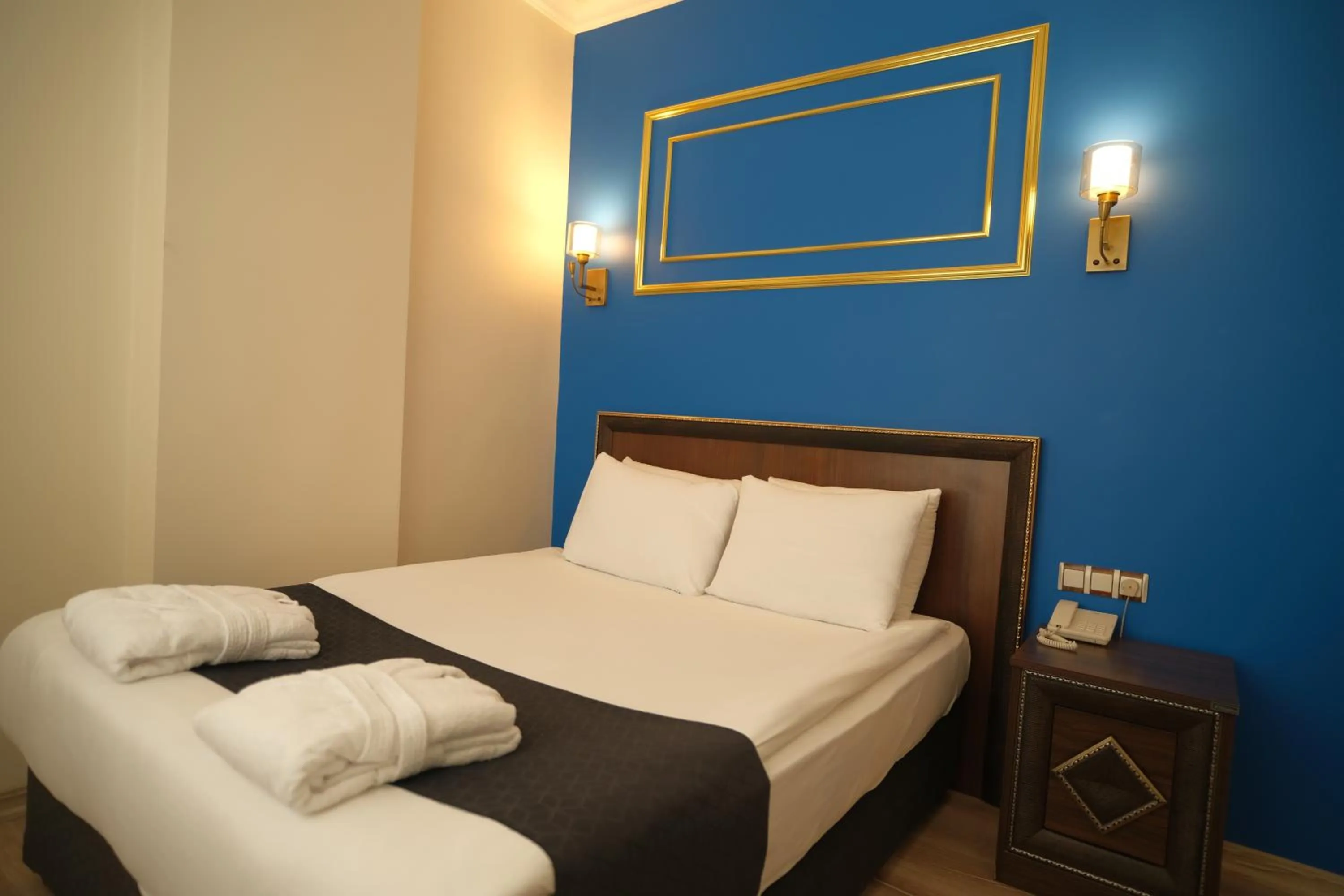 Bedroom in Malabadi Hotel