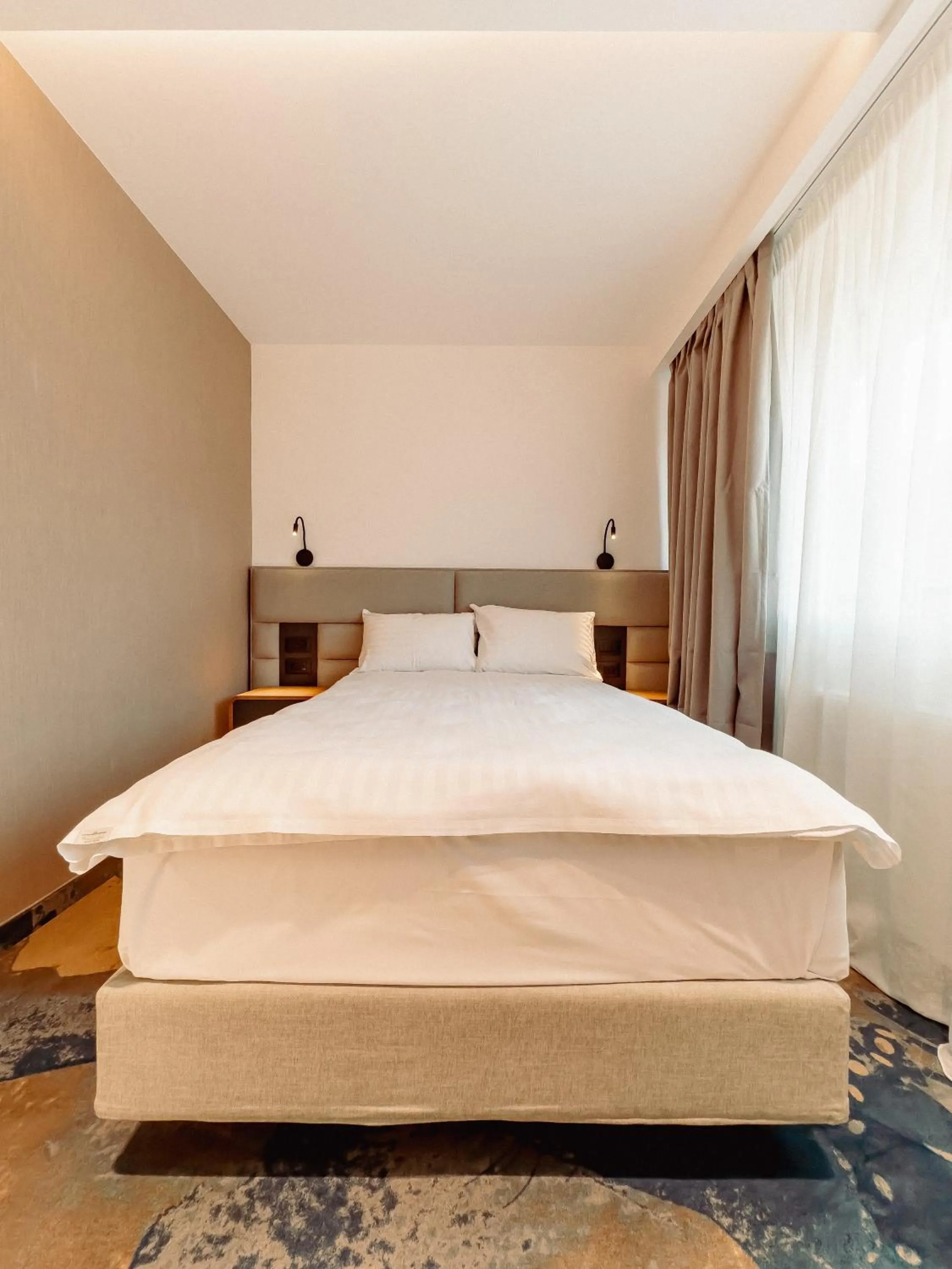 Bed in Hotel Alexandrion Experience