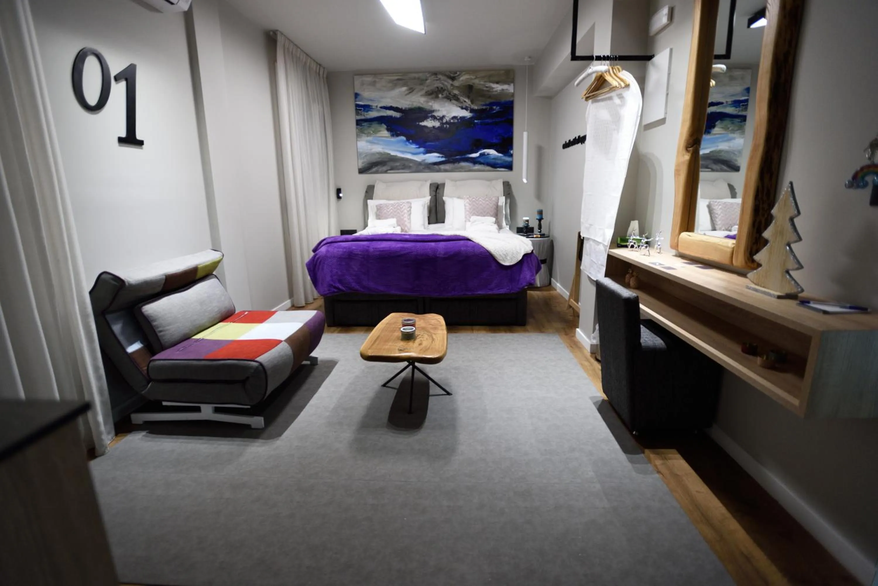 Bed in Magnifique Luxury Suites