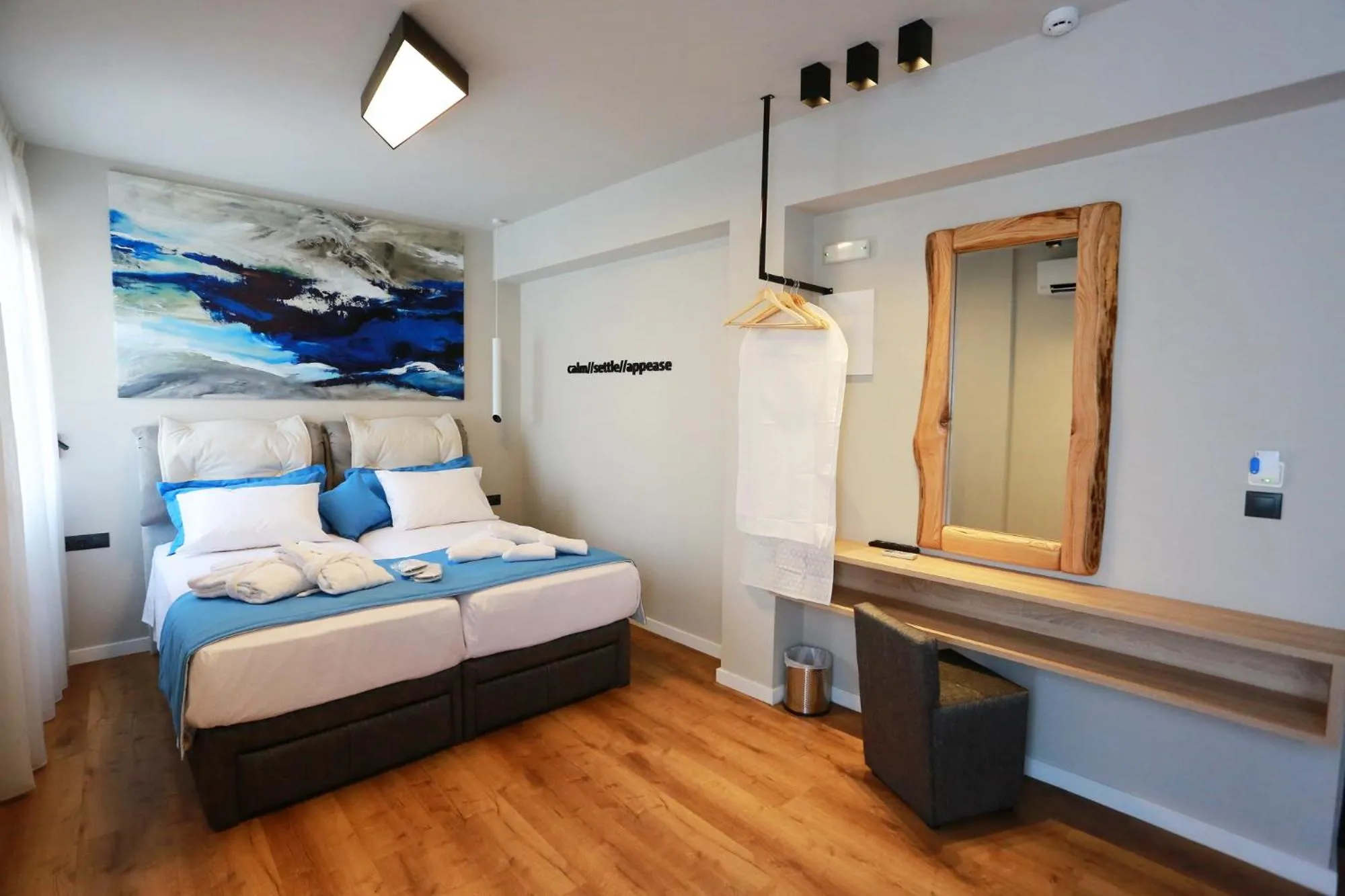 Bed in Magnifique Luxury Suites