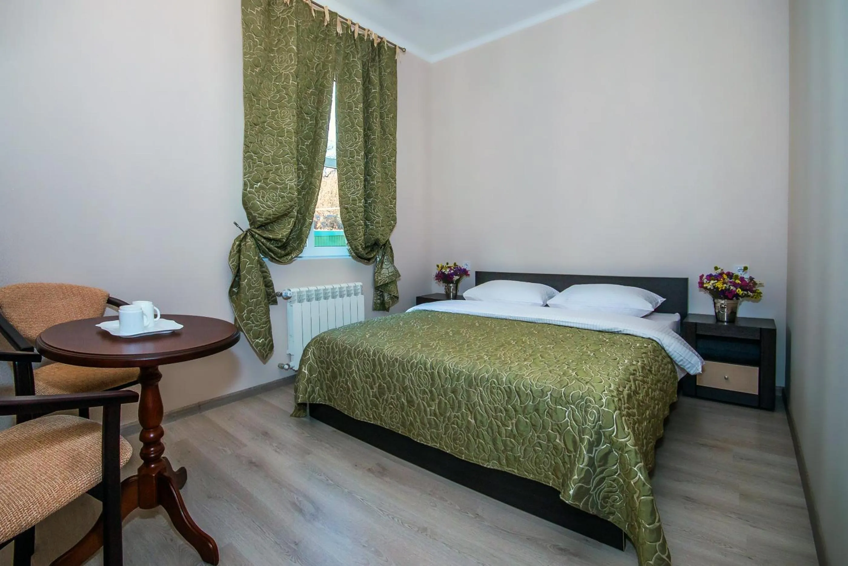 Decorative detail, Bed in Mini Hotel Ryleev