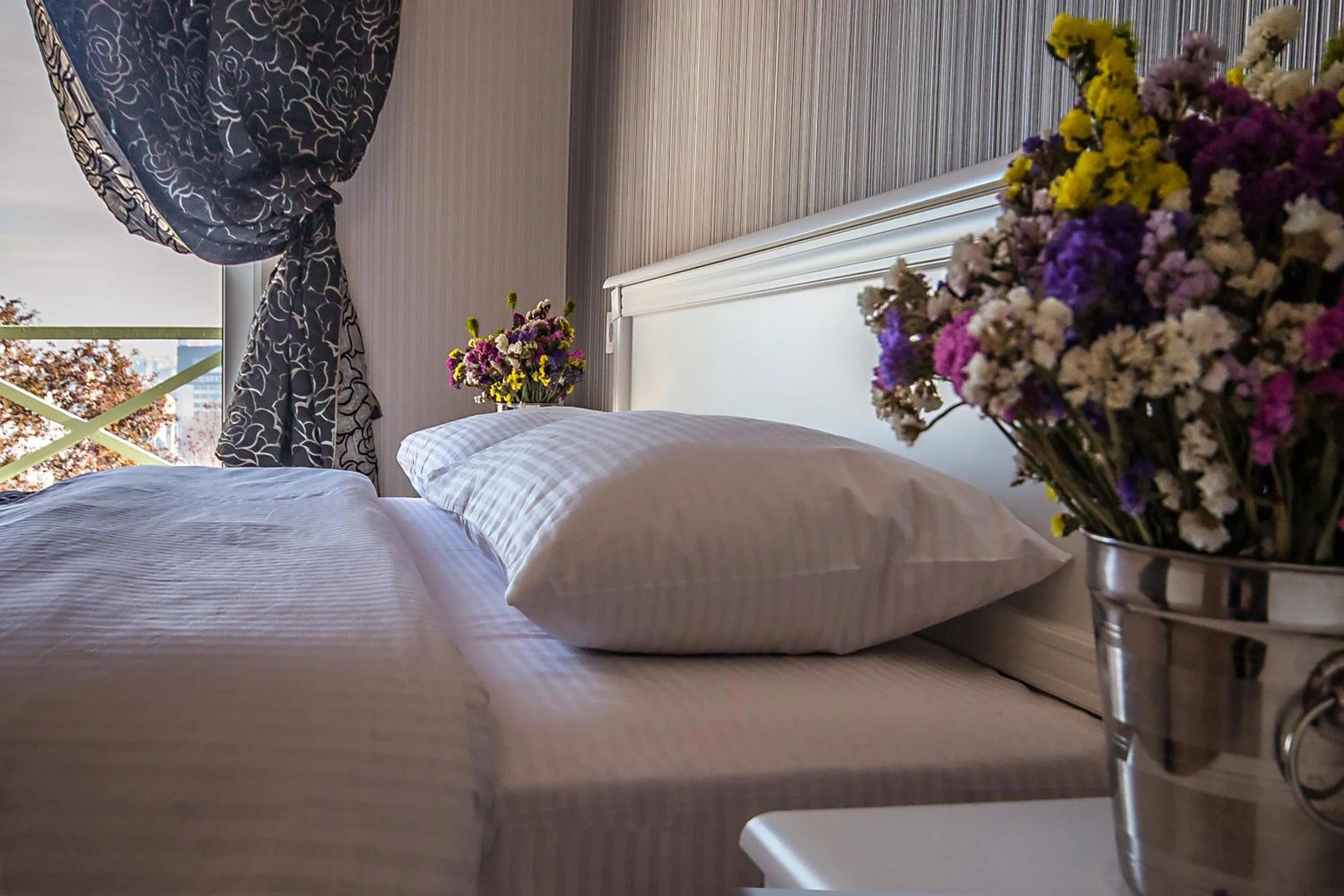 Decorative detail, Bed in Mini Hotel Ryleev