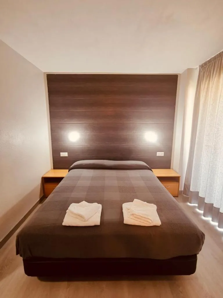 Bed in Hotel Delicias