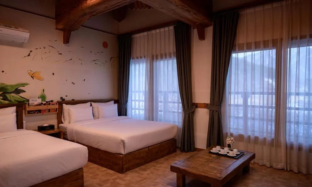 Bed in Jeonju Wangyijimil Hanok Hotel