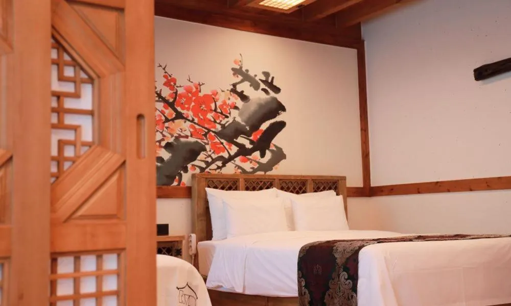 Bed in Jeonju Wangyijimil Hanok Hotel