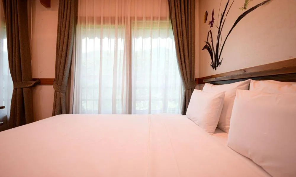 Bed in Jeonju Wangyijimil Hanok Hotel