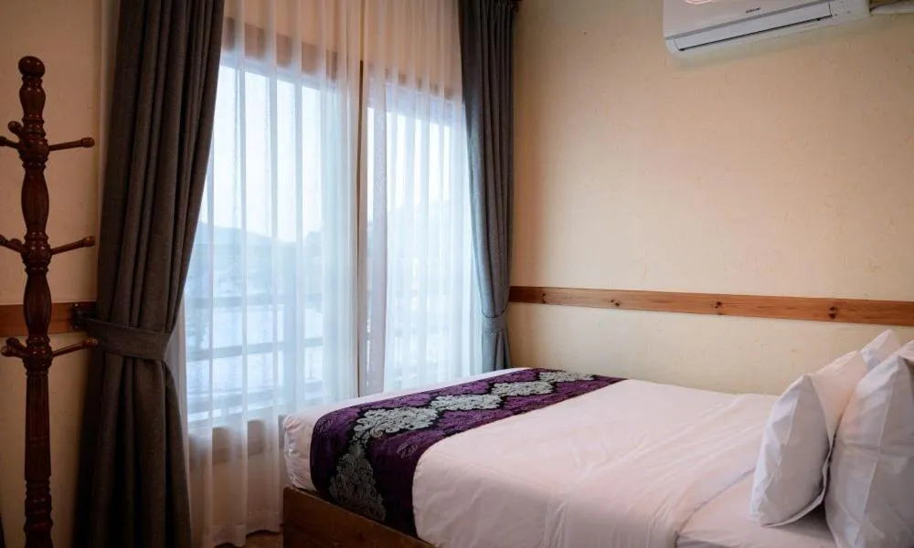 Bed in Jeonju Wangyijimil Hanok Hotel