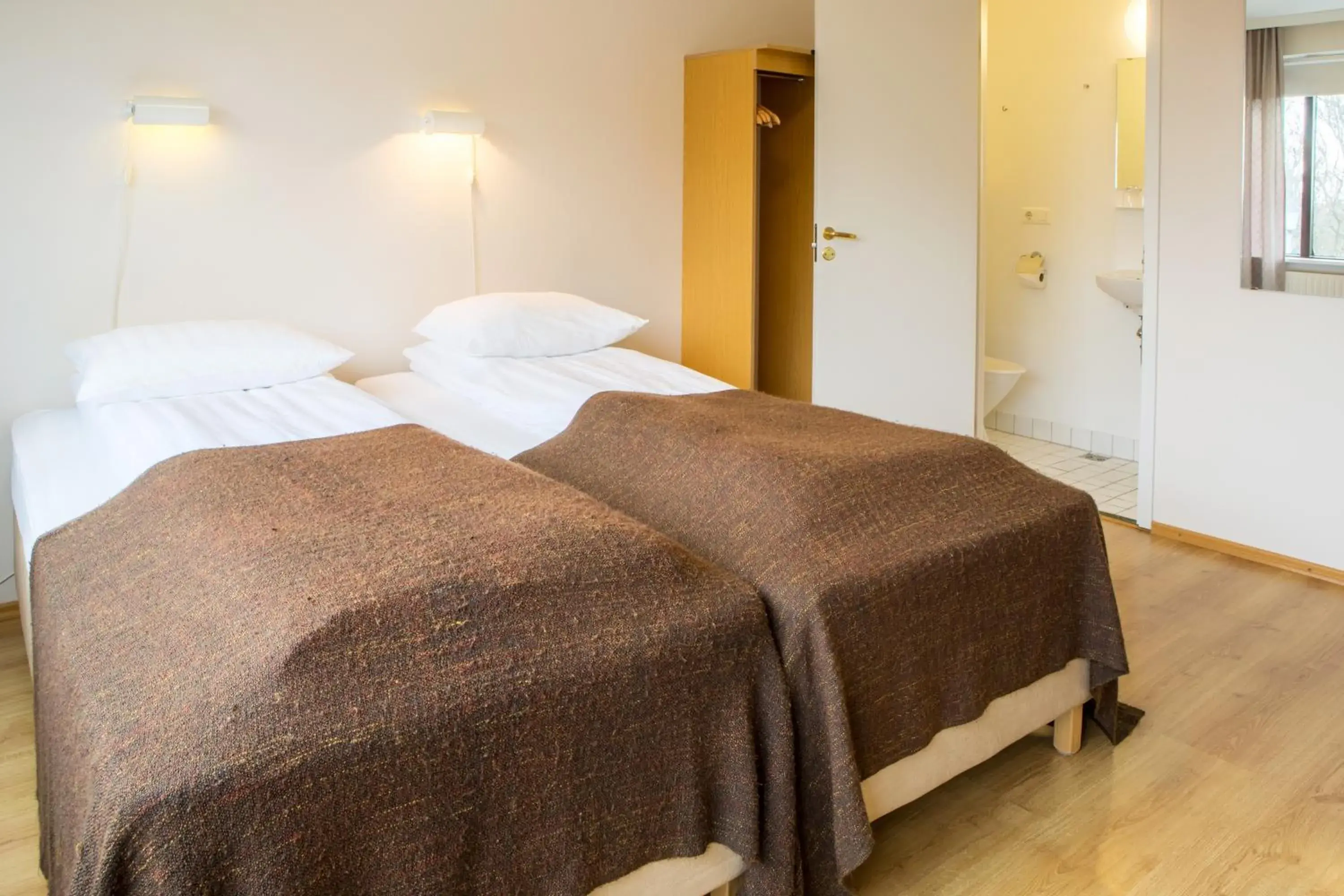 Photo of the whole room, Bed in Guesthouse Sunna Photo of the whole room, Bed in Guesthouse Sunna