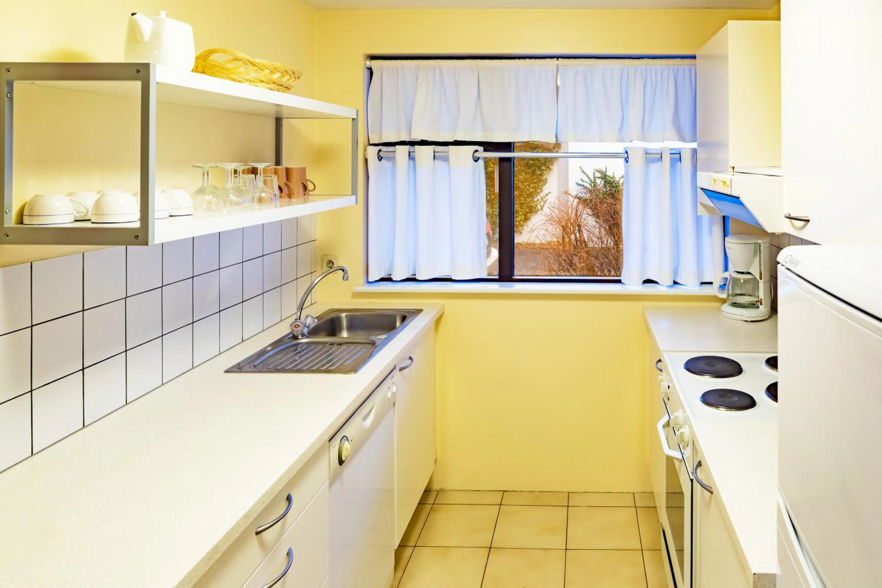 Kitchen or kitchenette in Guesthouse Sunna