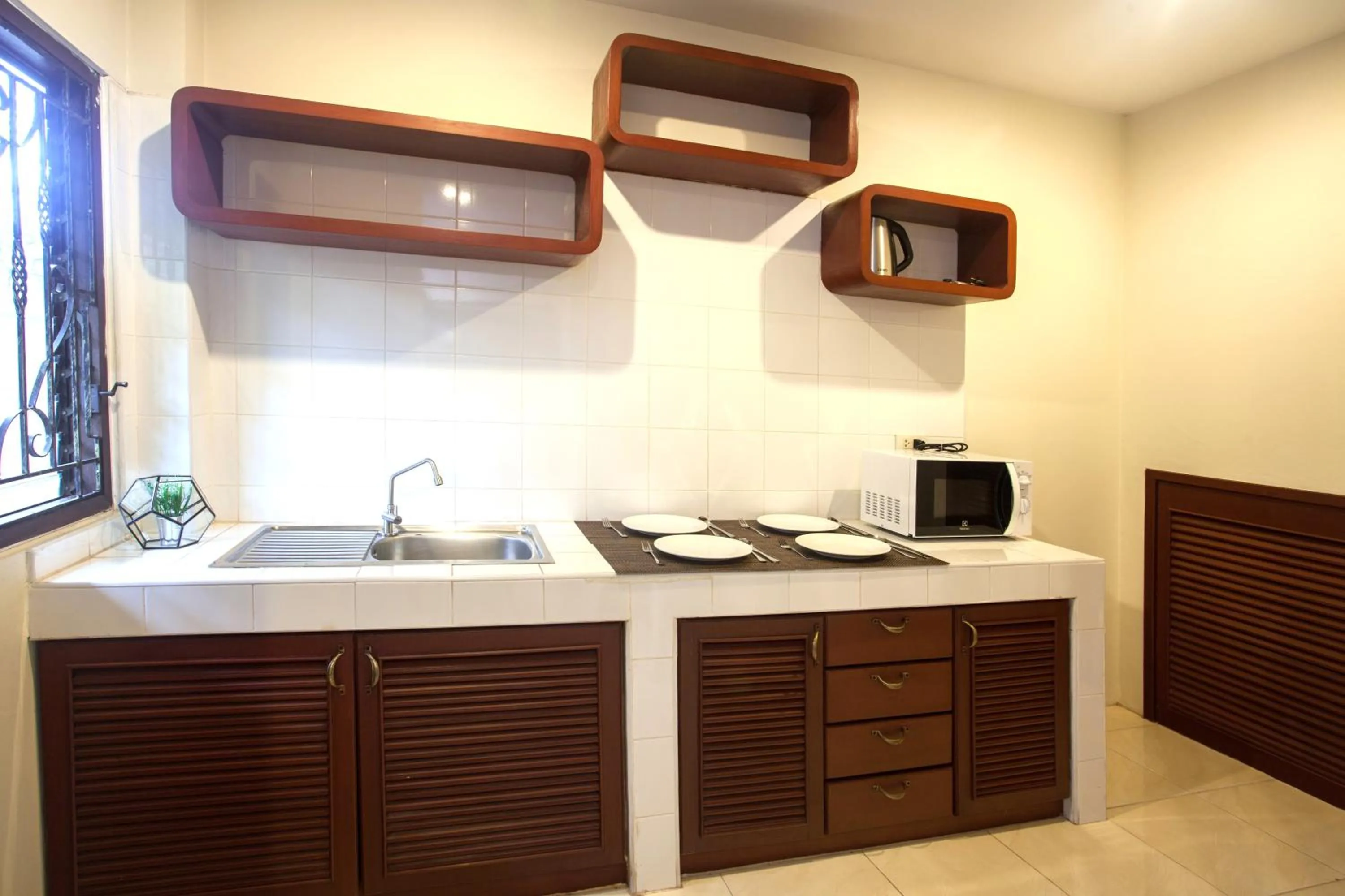 Dining area in Achawalai Residence Village By Song