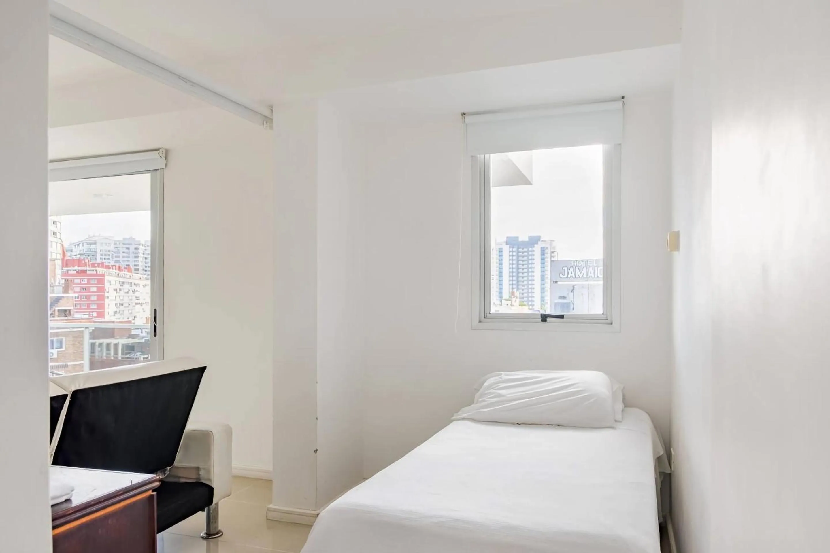 Living room, Bed in Jamaica Punta del Este Hotel & Residence