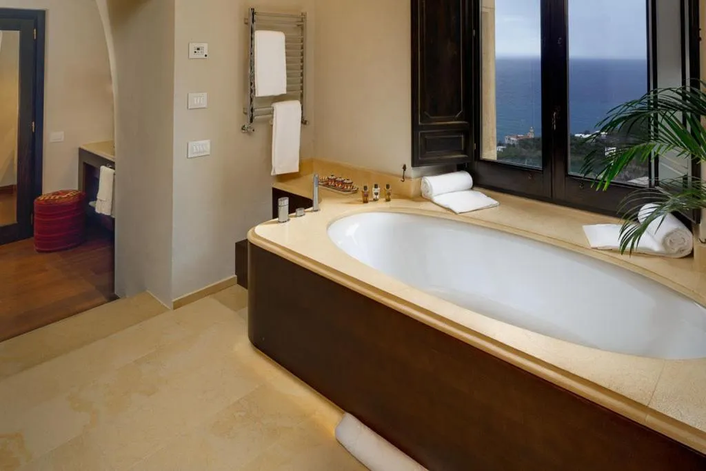 Bathroom, Bed in Monastero Santa Rosa Hotel & Spa