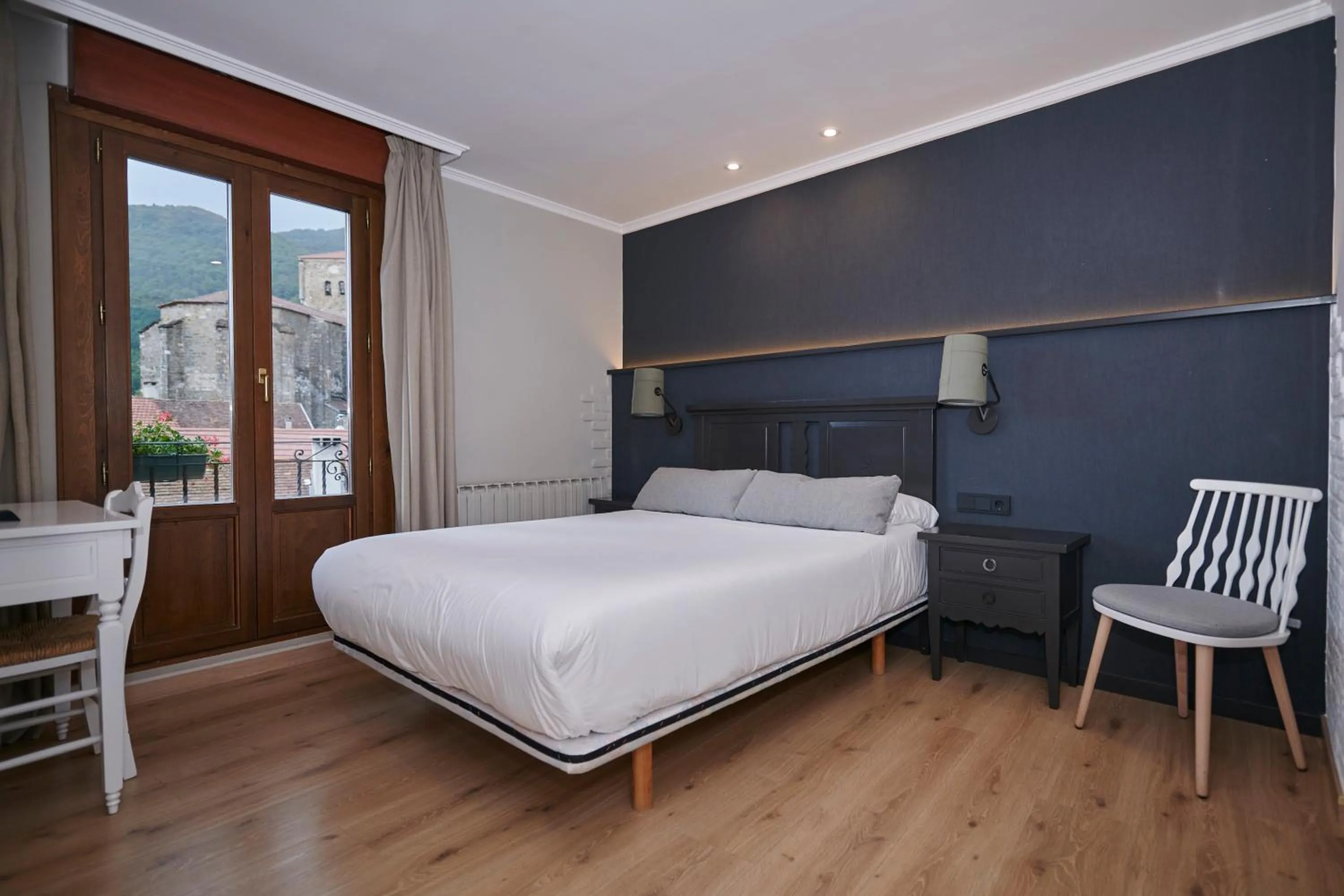 Photo of the whole room, Bed in Hostal Lola