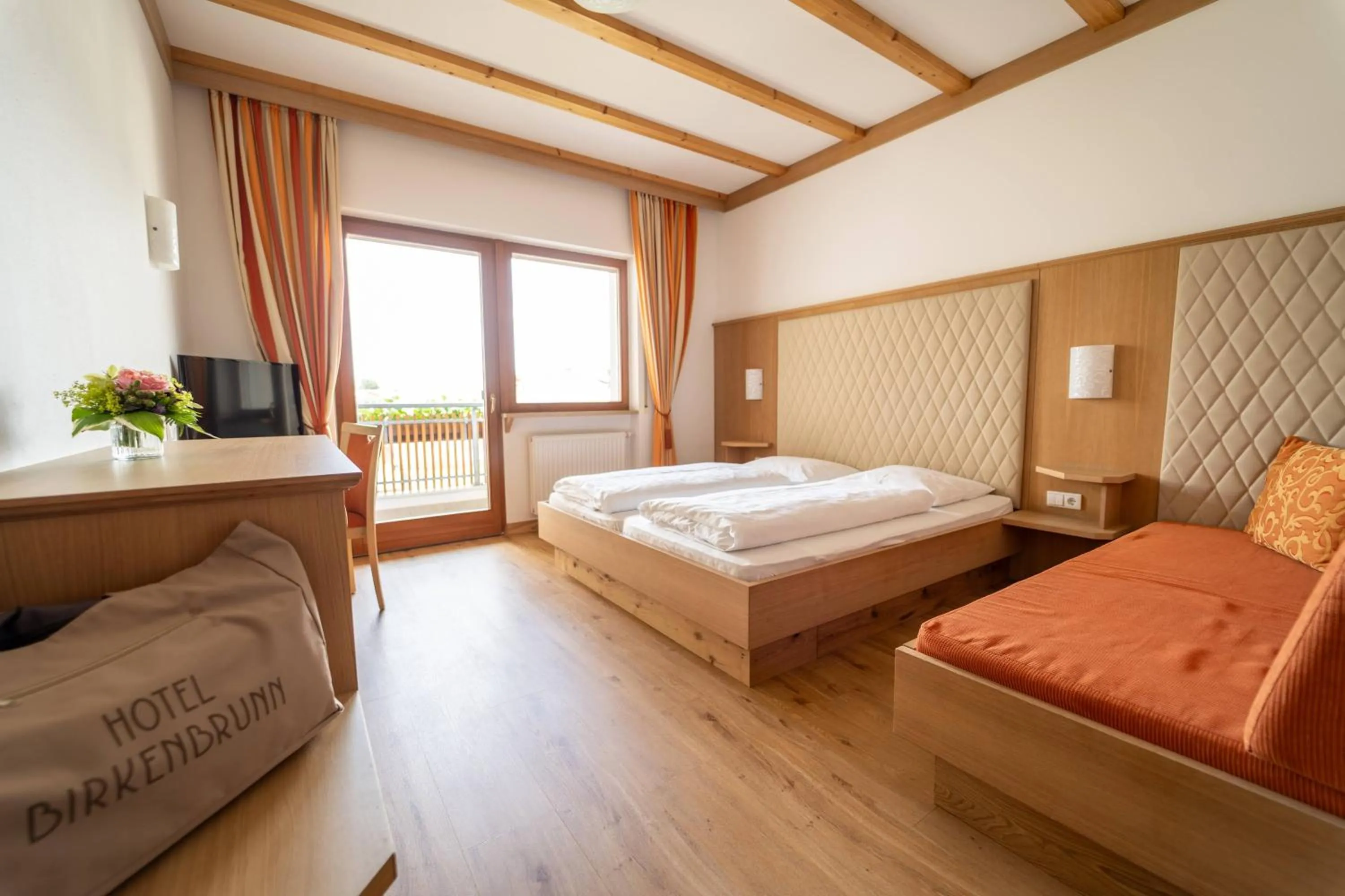 Bathroom, Bed in Hotel Birkenbrunn