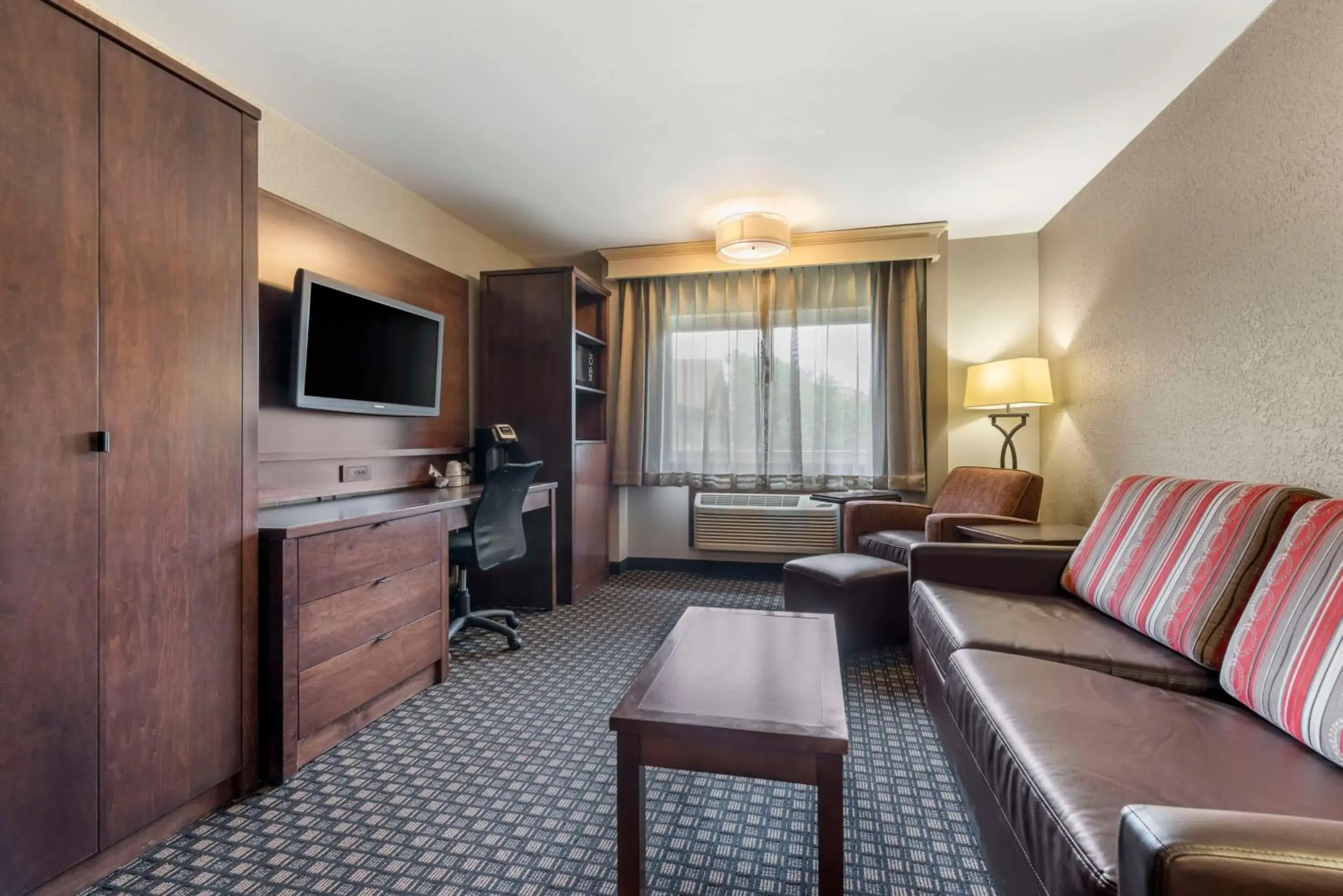 Standard King Suite with Sofa Bed - Non-Smoking in Best Western Plus Ramkota Hotel Standard King Suite with Sofa Bed - Non-Smoking in Best Western Plus Ramkota Hotel