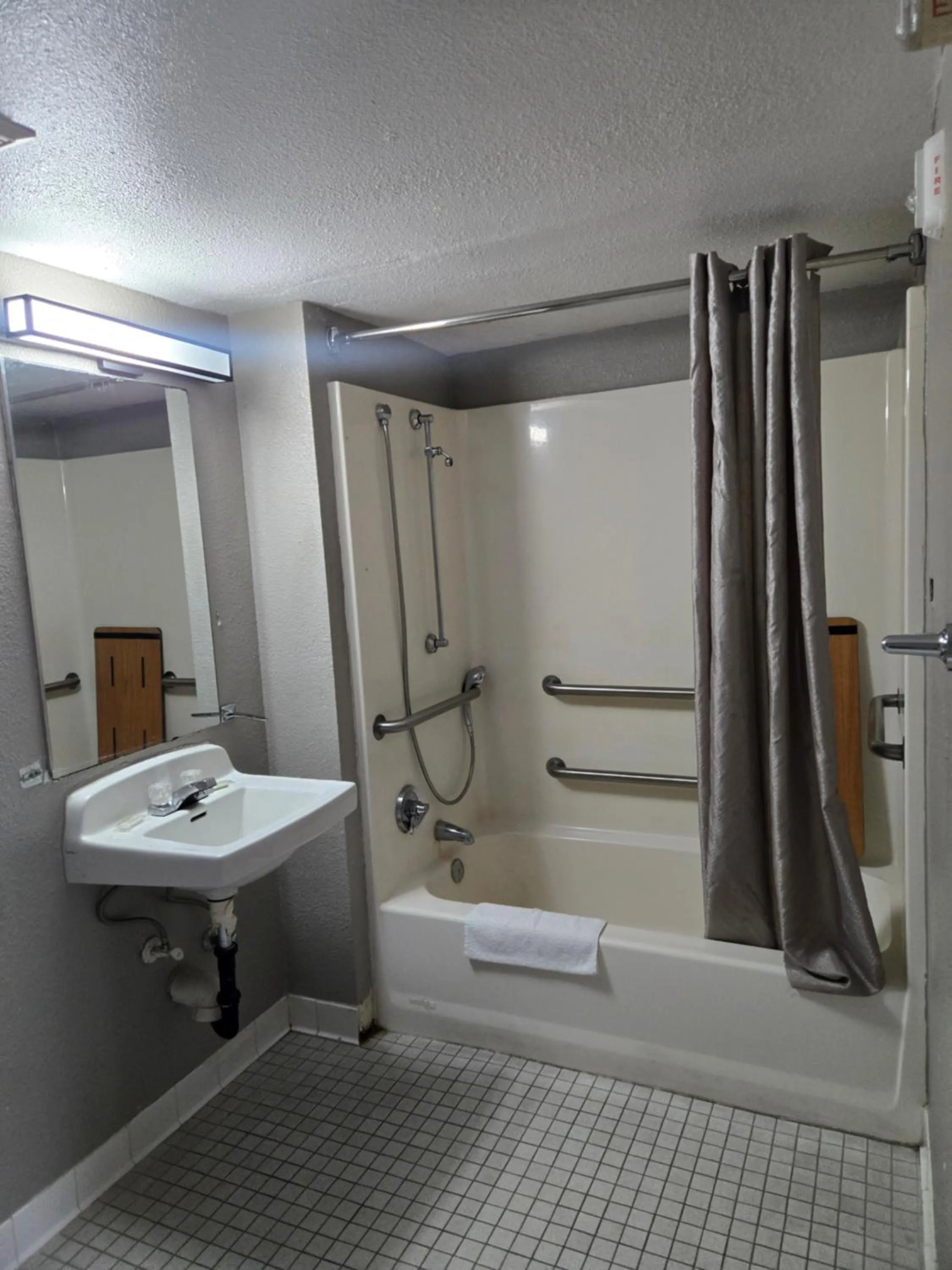 Bathroom in Super 8 by Wyndham Tracy