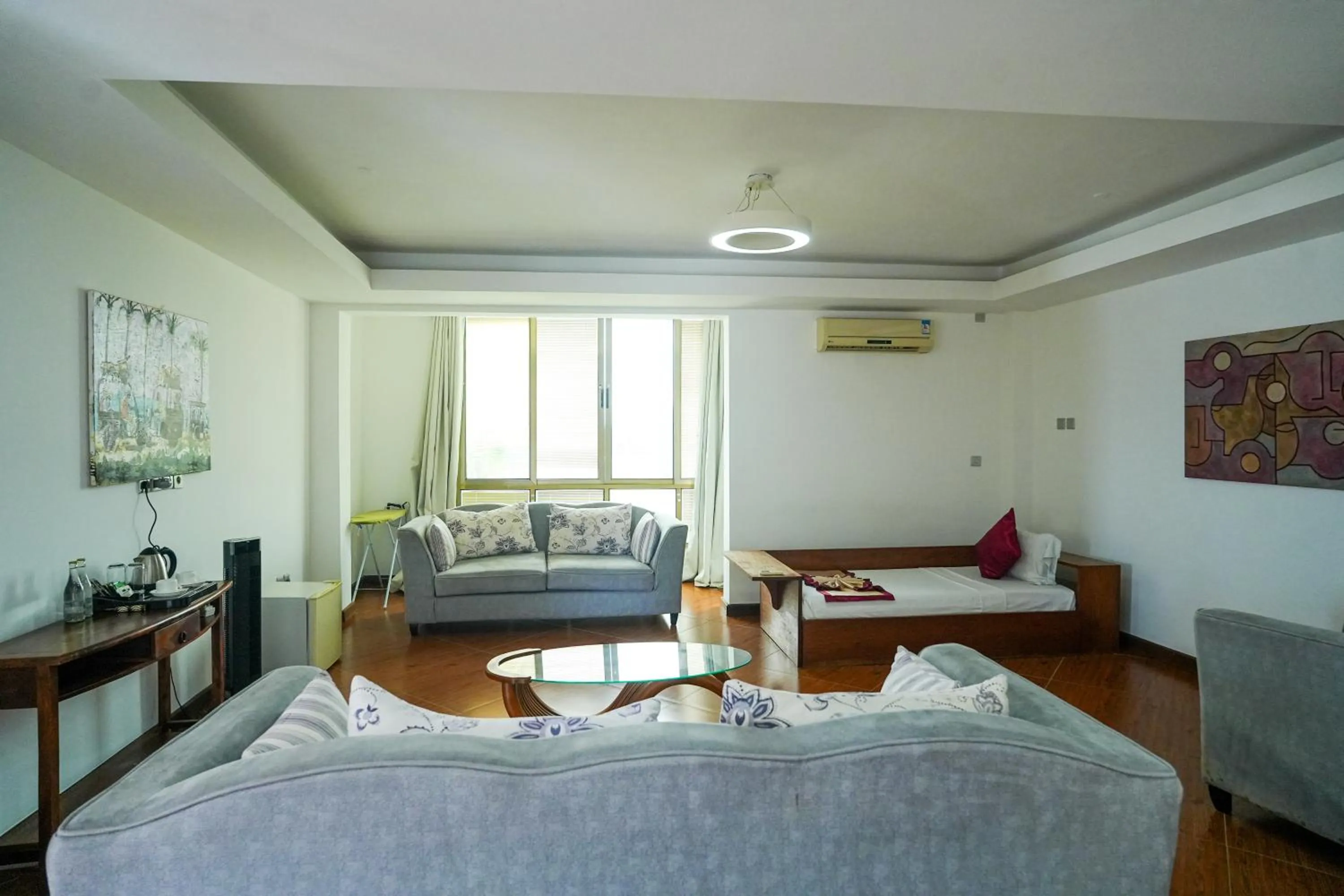 Seating area, Bed in Seaclusion Diani