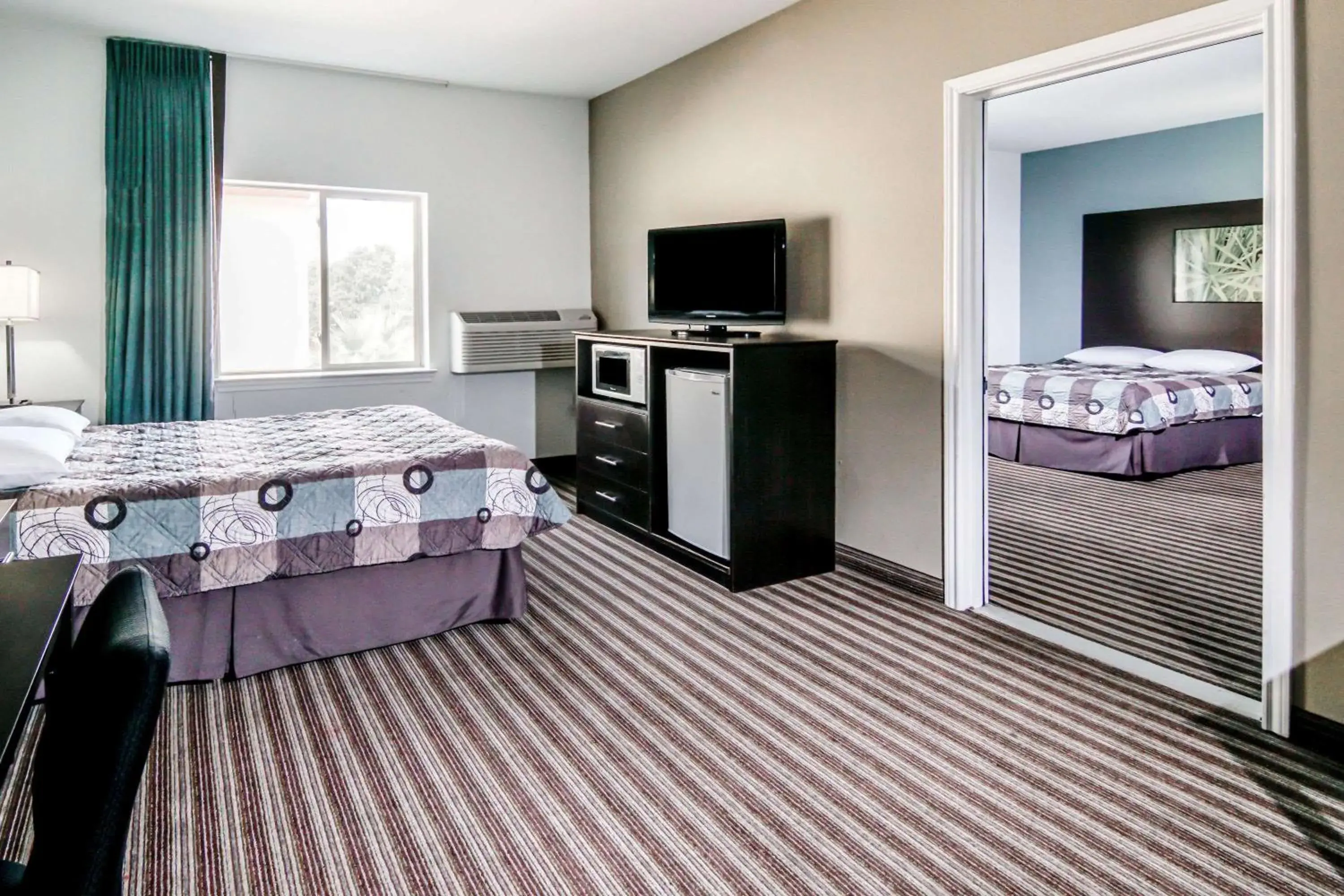 Photo of the whole room, Bed in Super 8 by Wyndham Brenham TX Photo of the whole room, Bed in Super 8 by Wyndham Brenham TX