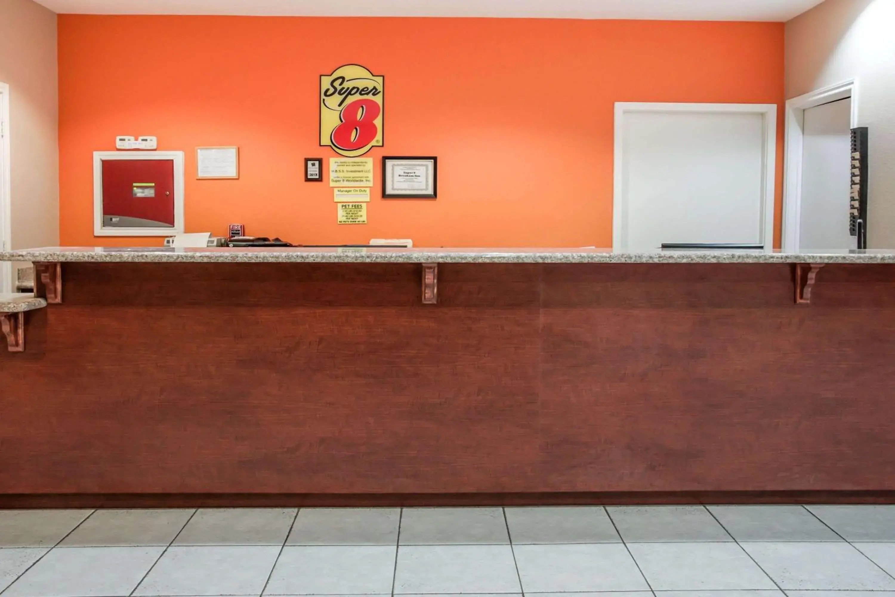 Lobby or reception in Super 8 by Wyndham Brenham TX Lobby or reception in Super 8 by Wyndham Brenham TX