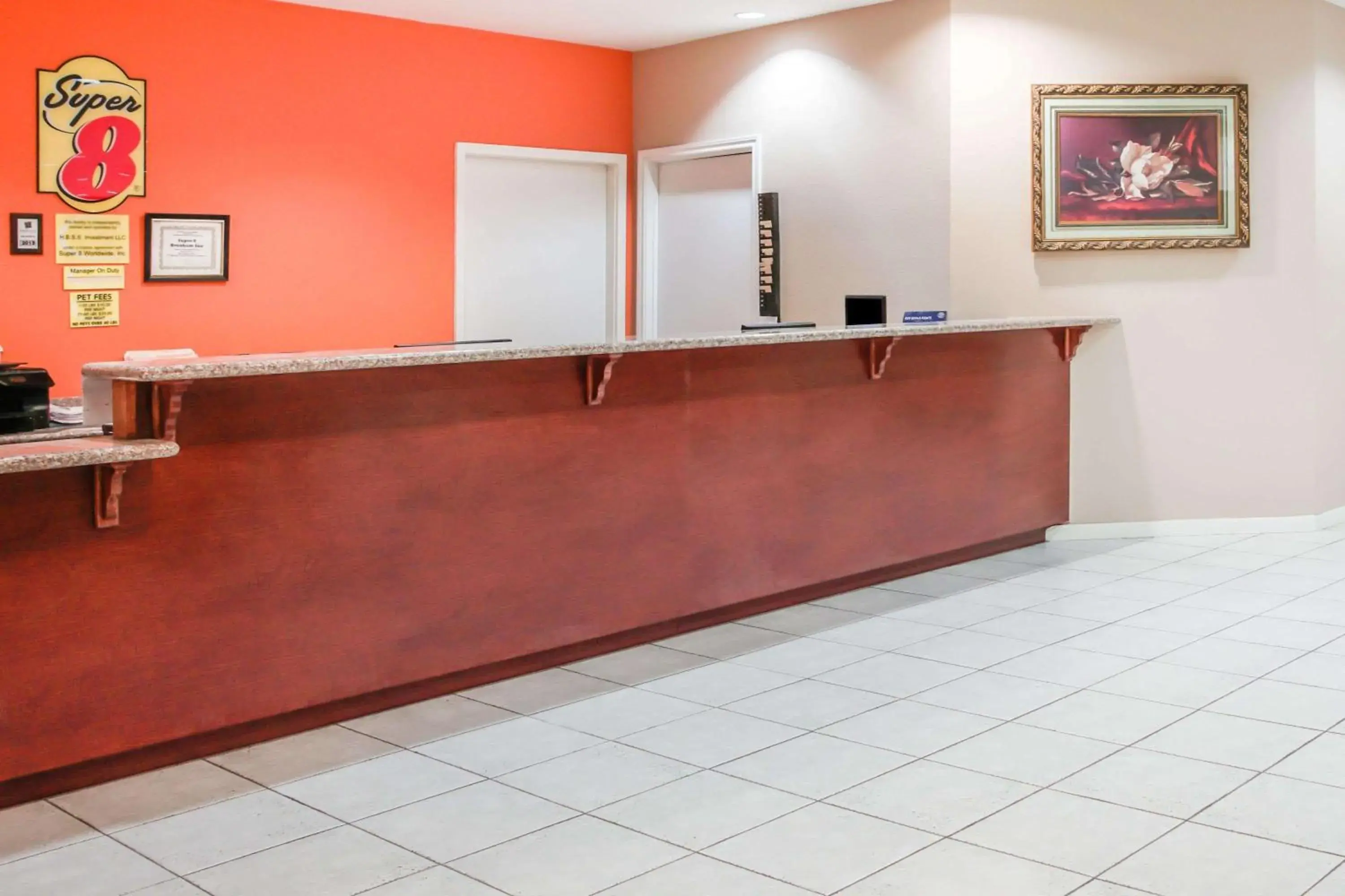 Lobby or reception in Super 8 by Wyndham Brenham TX Lobby or reception in Super 8 by Wyndham Brenham TX