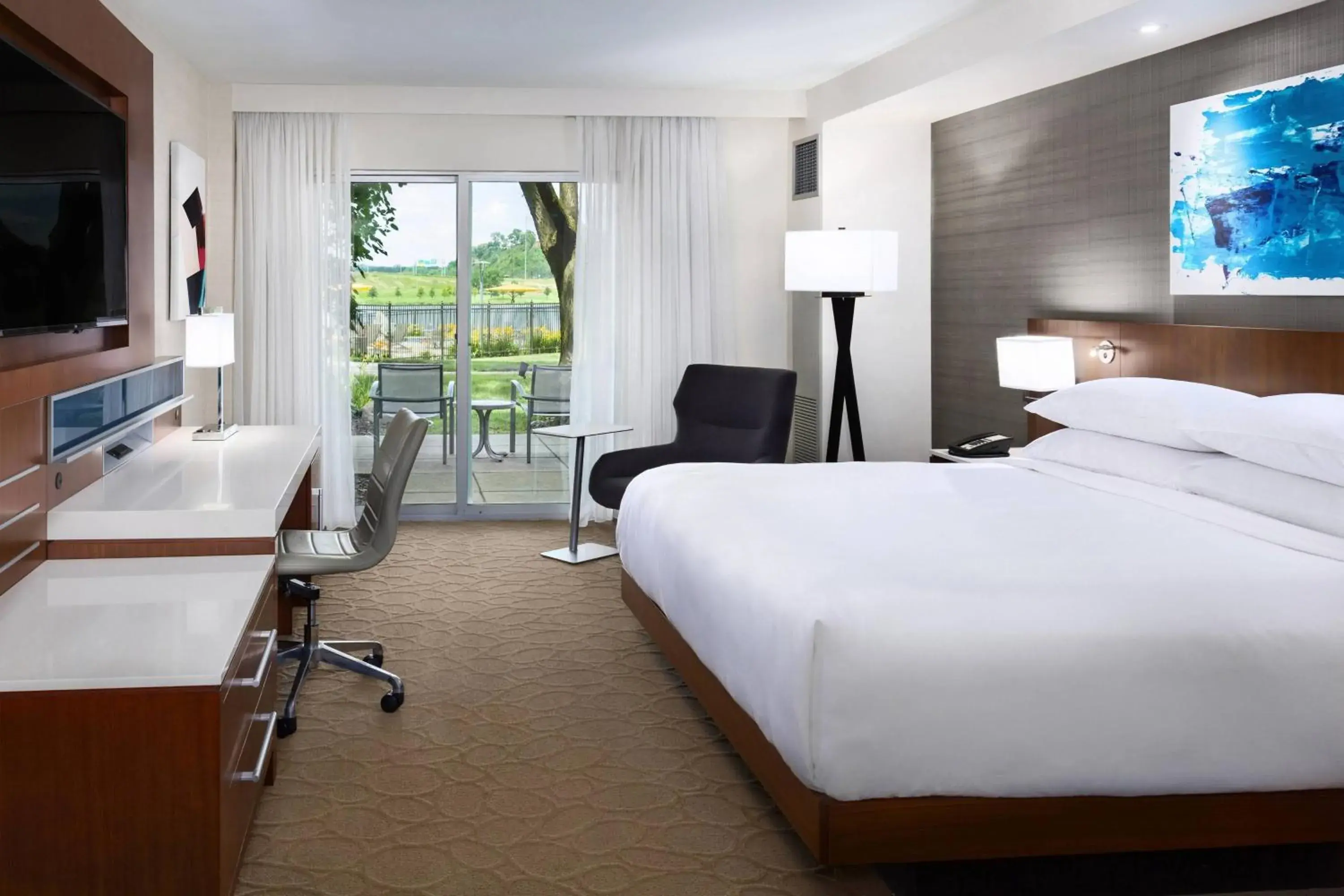 Guest room, 1 King, River view, patio in South Sioux City Marriott Riverfront Guest room, 1 King, River view, patio in South Sioux City Marriott Riverfront