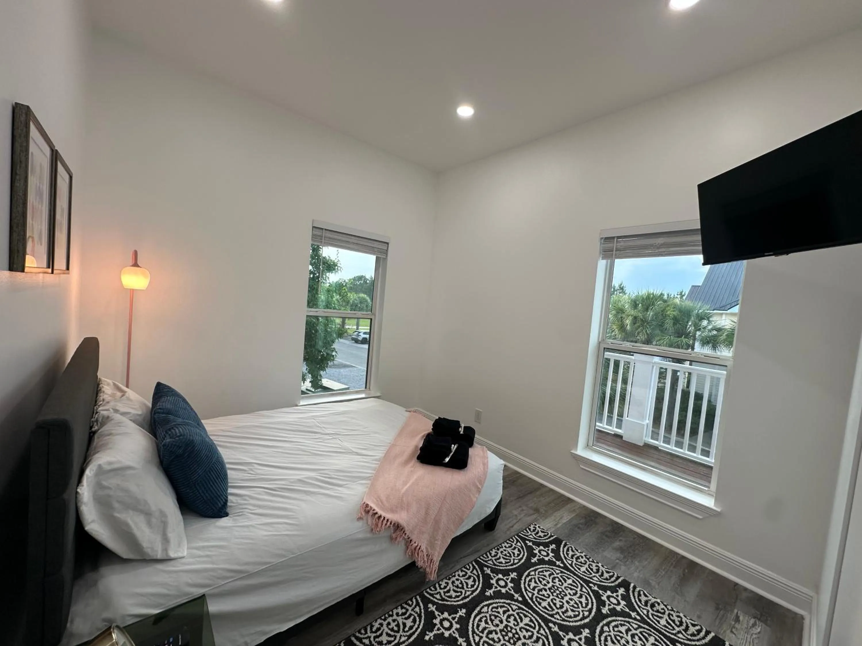 Bed in 30-A Inn & Suites