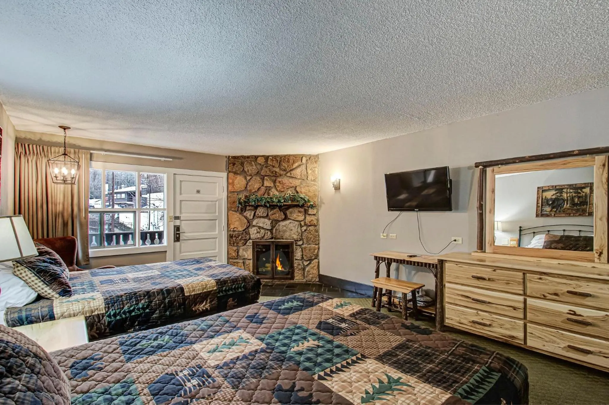 fireplace, Bed in Brookside Lodge