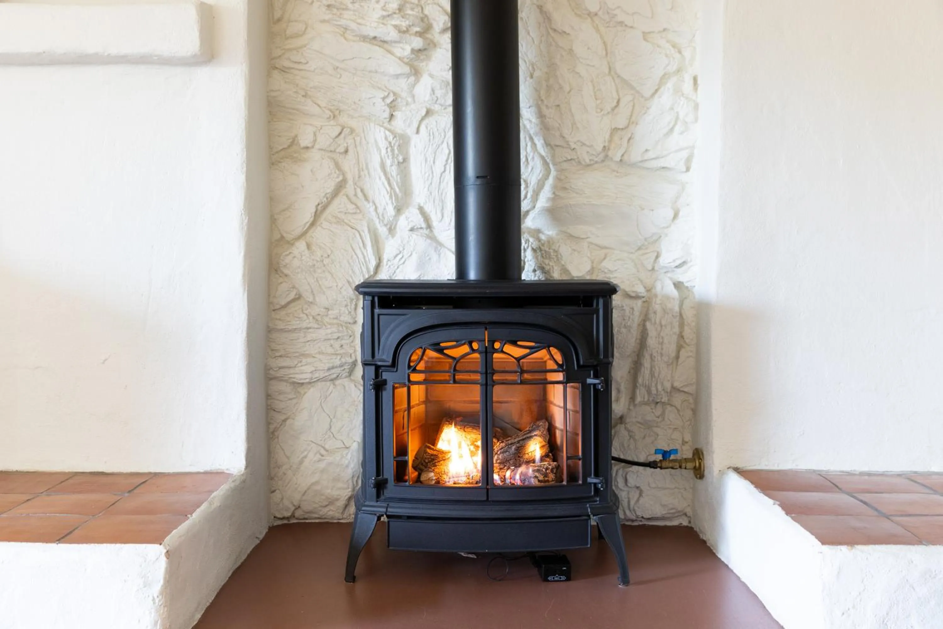 fireplace in Scribner's Catskill Lodge, a Member of Design Hotels
