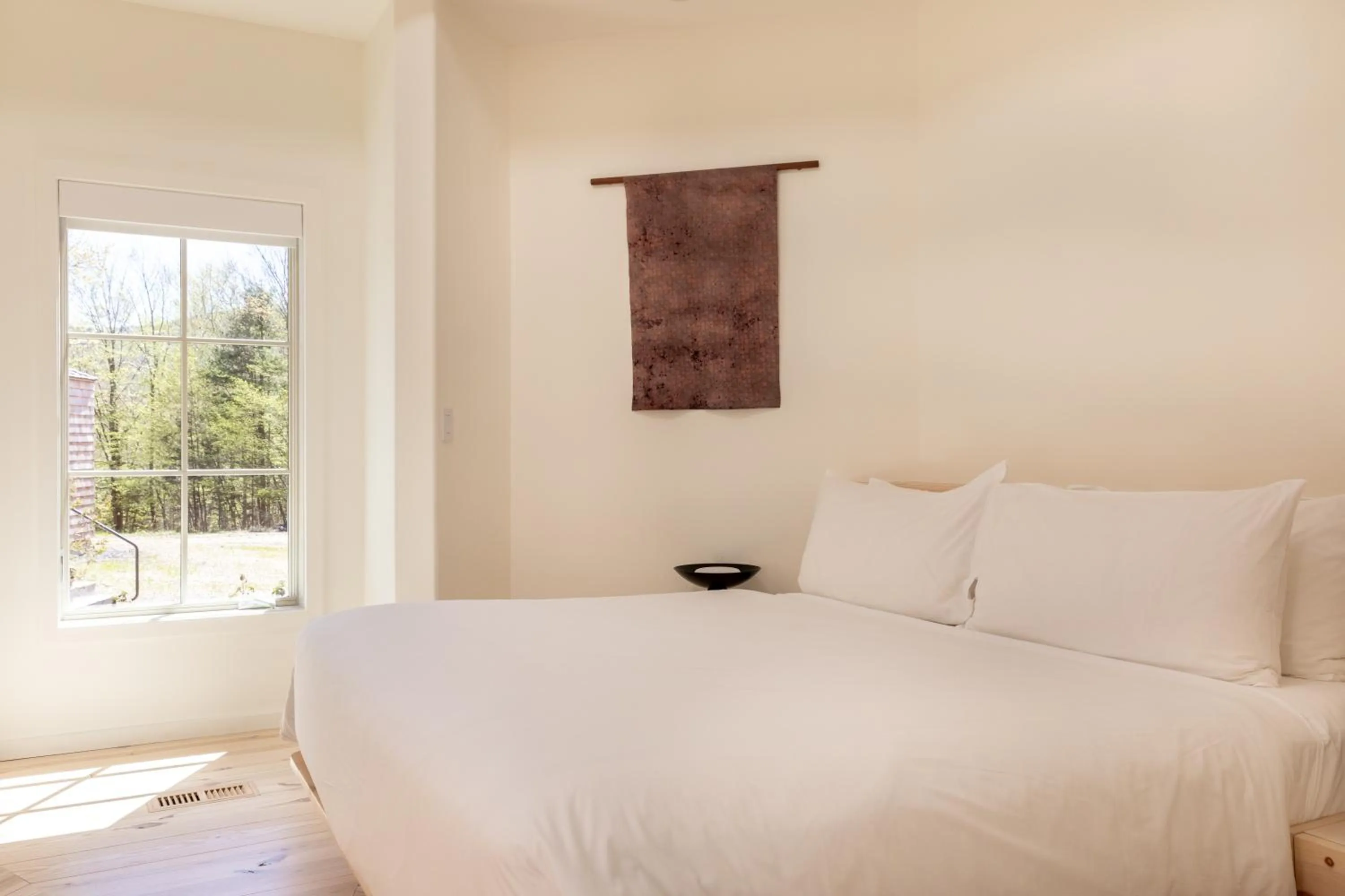 Bed in Scribner's Catskill Lodge, a Member of Design Hotels