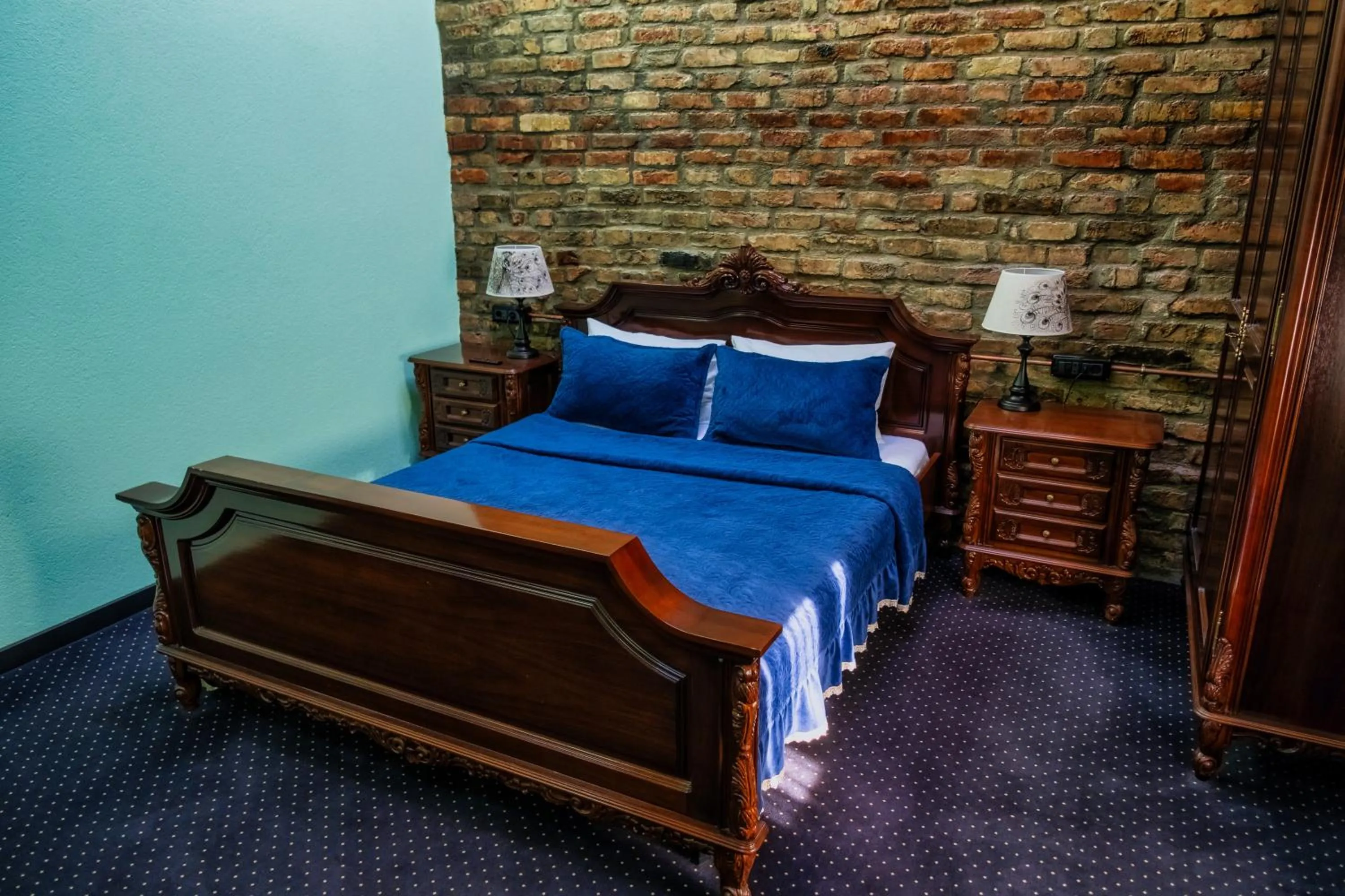 Bed in JMR Royal -Luxury Rooms & Private Sauna