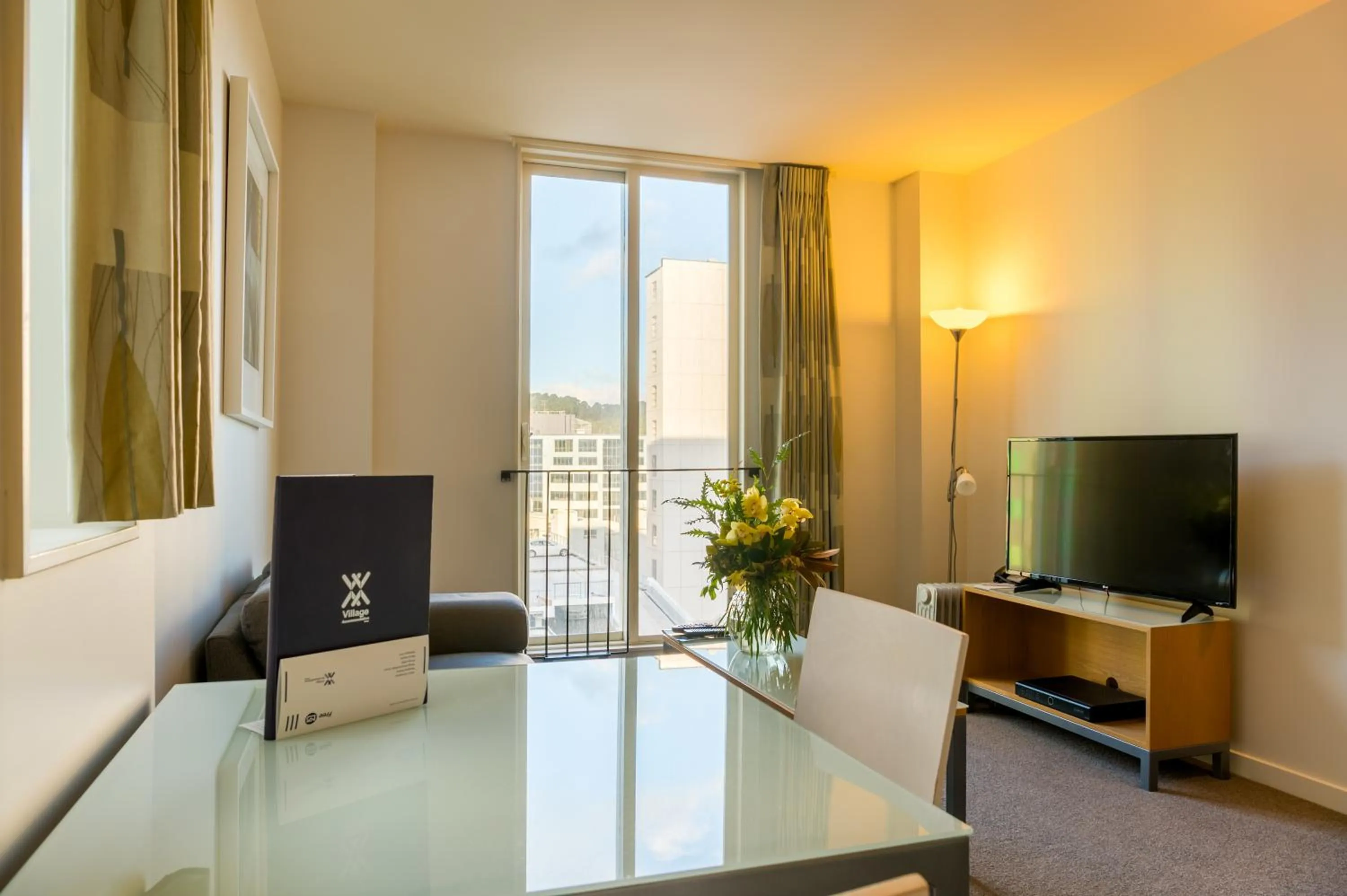 Communal lounge/ TV room in Astelia Apartment Hotel