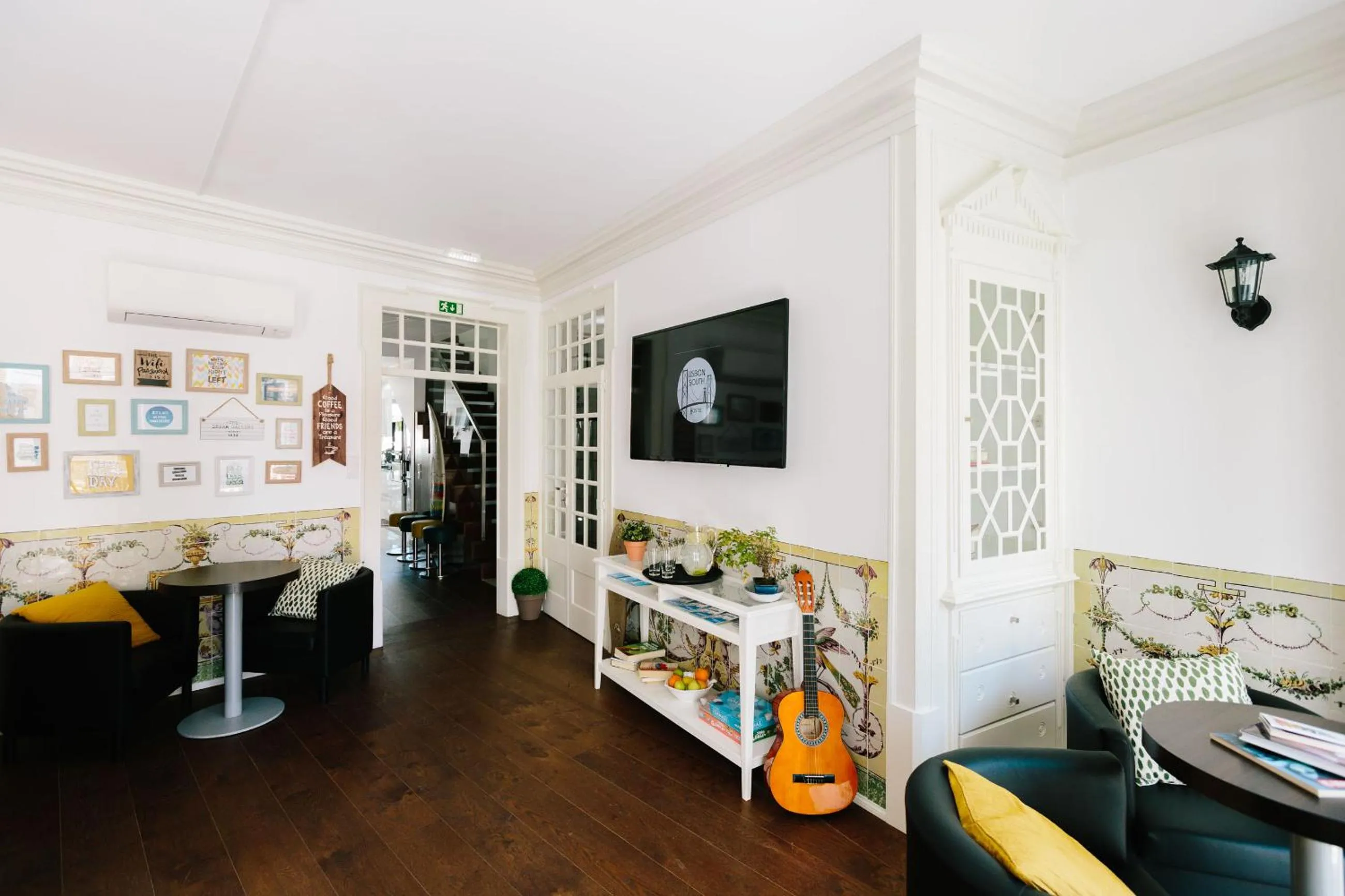 Communal lounge/ TV room in Lisbon South Hostel
