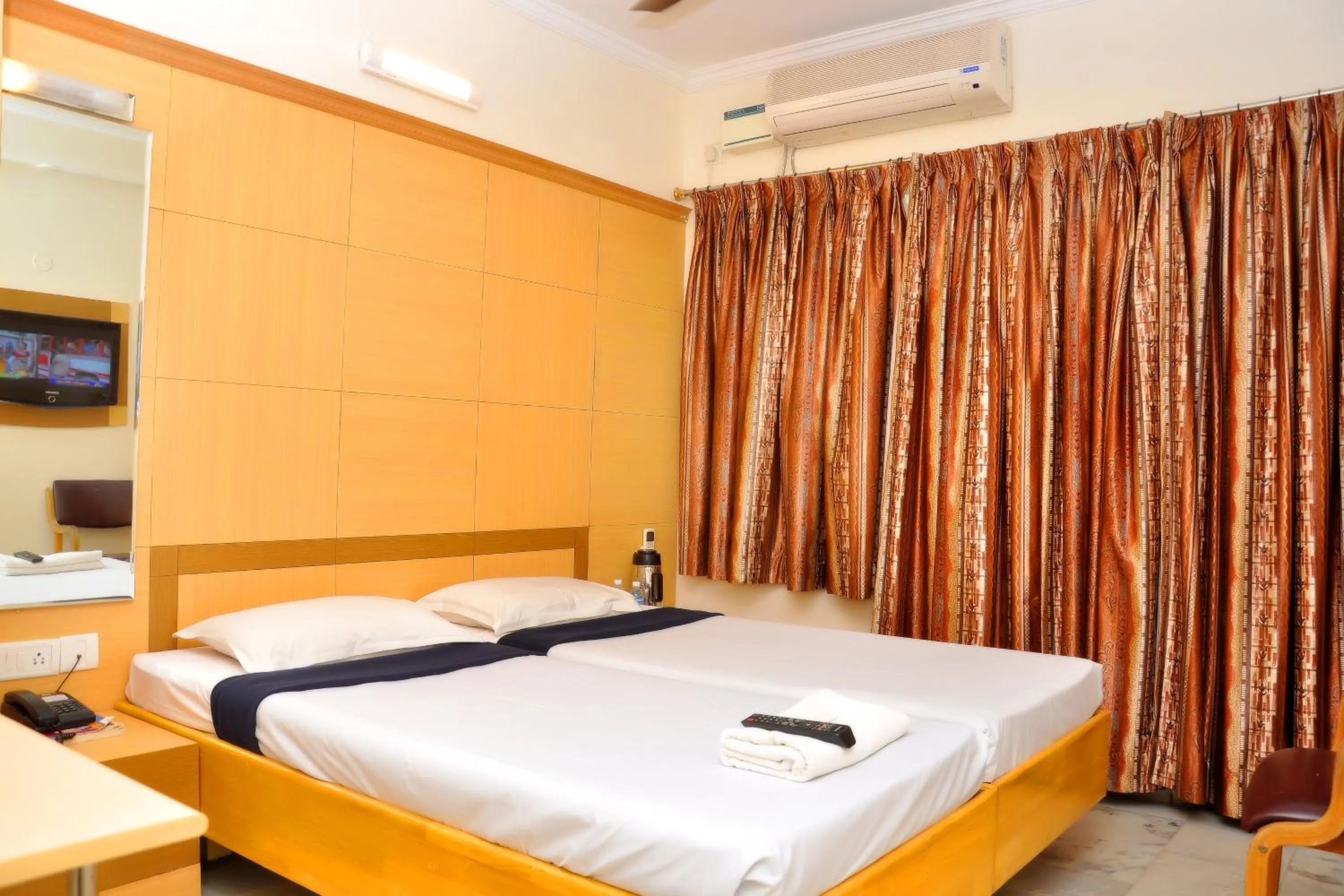 Bed in Nayagara Hotel