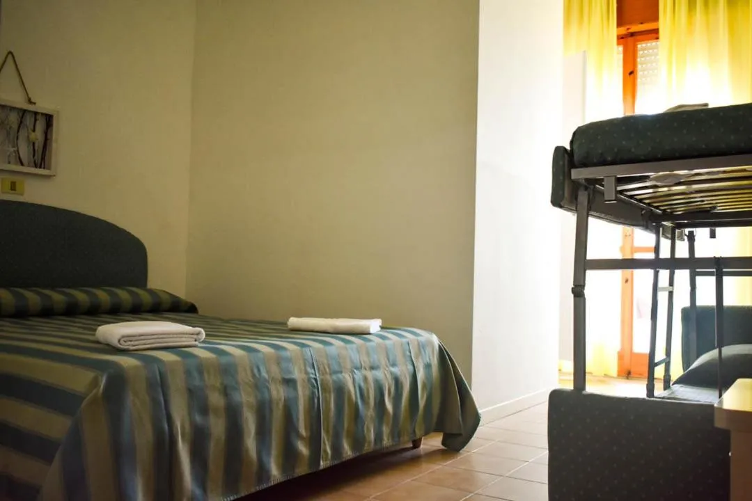 Bed in Hotel Embassy