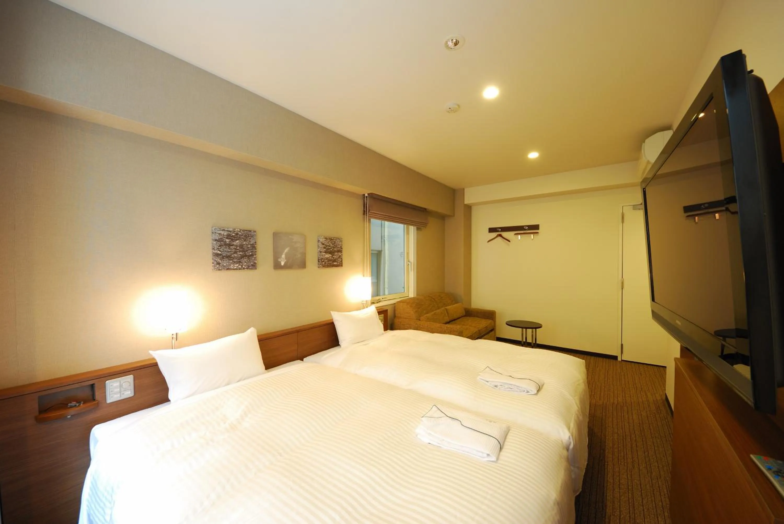 Bed in Sotetsu Fresa Inn Hamamatsucho-Daimon